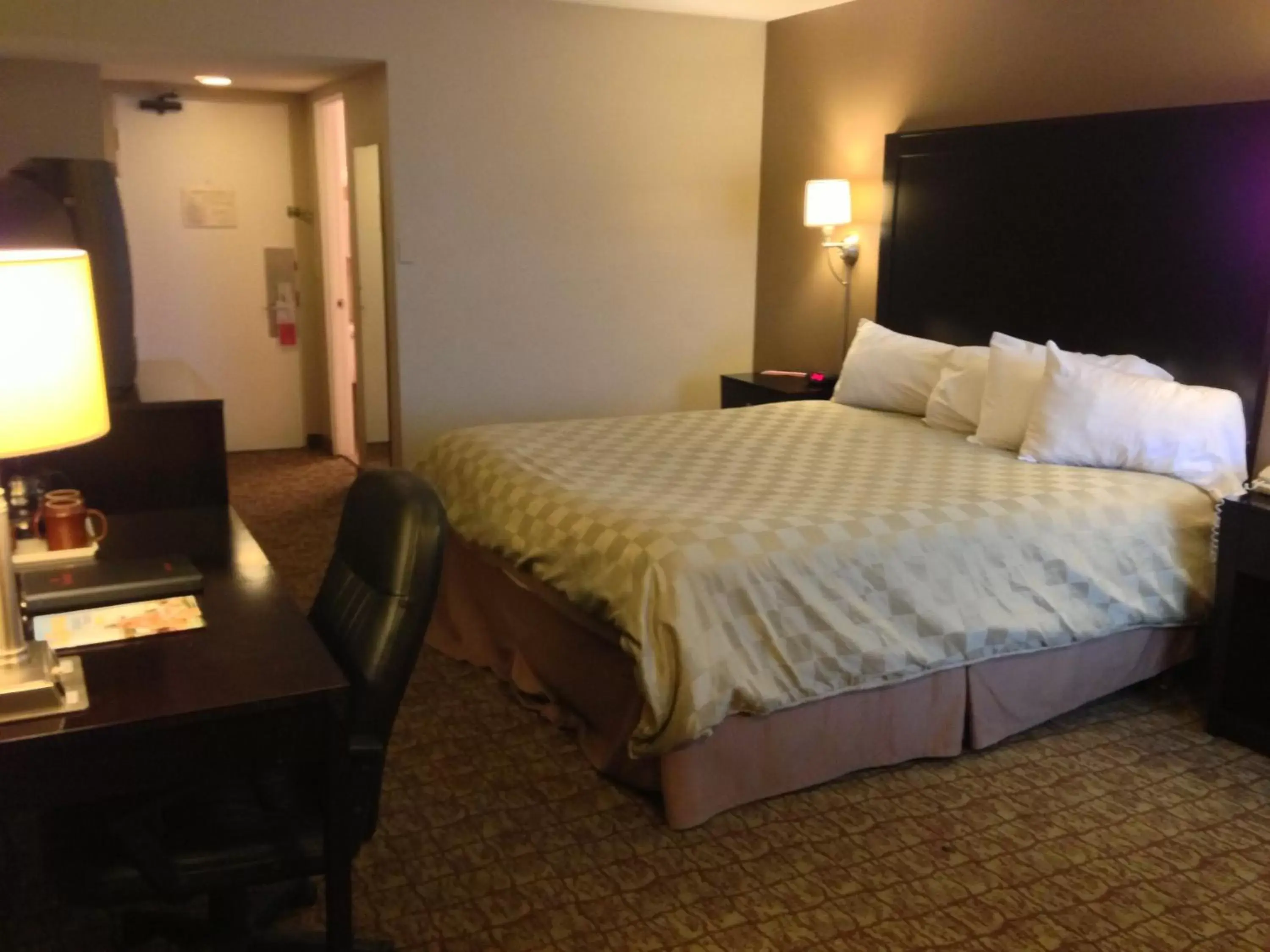 Photo of the whole room, Bed in Ramada by Wyndham Fresno North