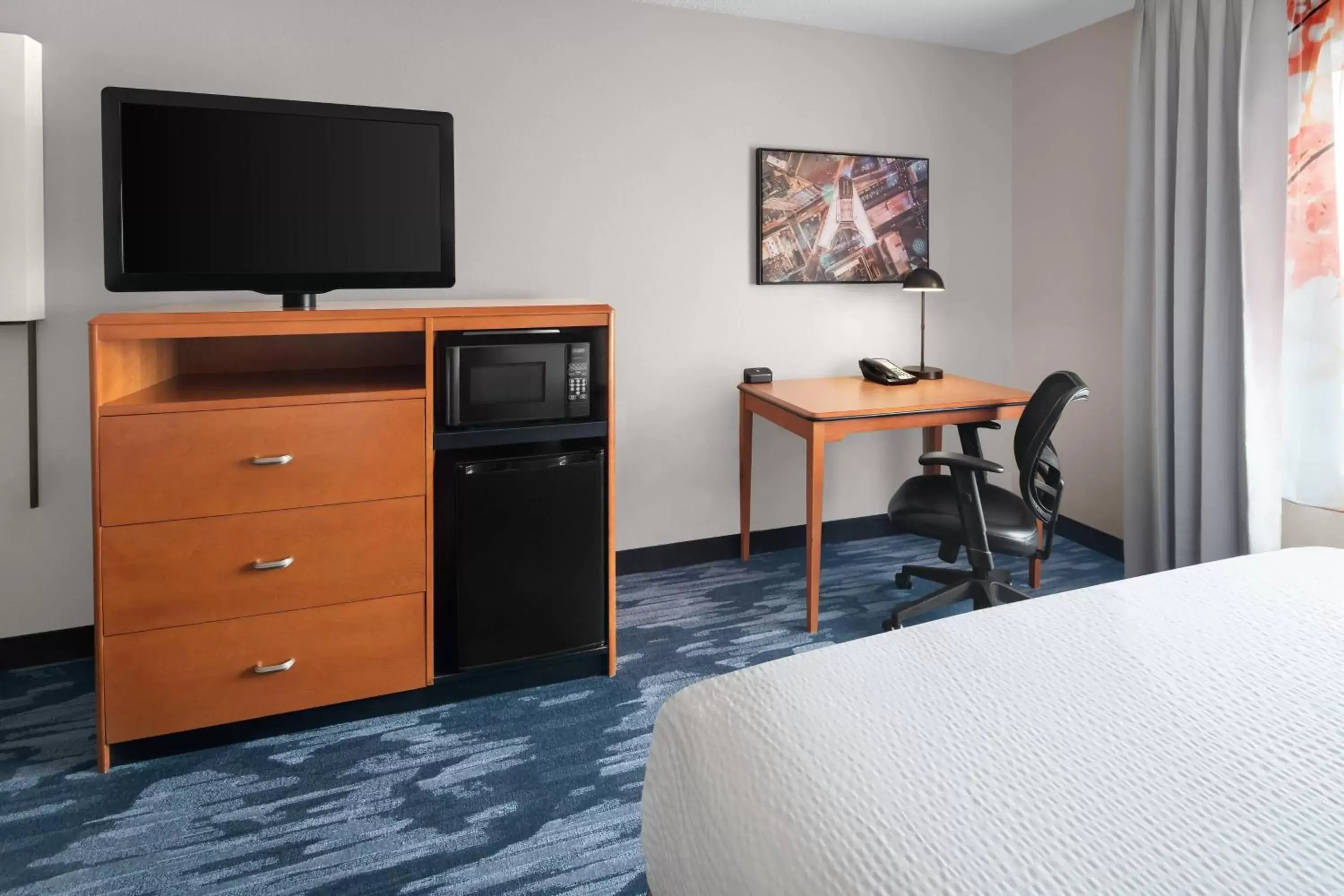 Photo of the whole room, TV/Entertainment Center in Fairfield Inn & Suites Denver Airport