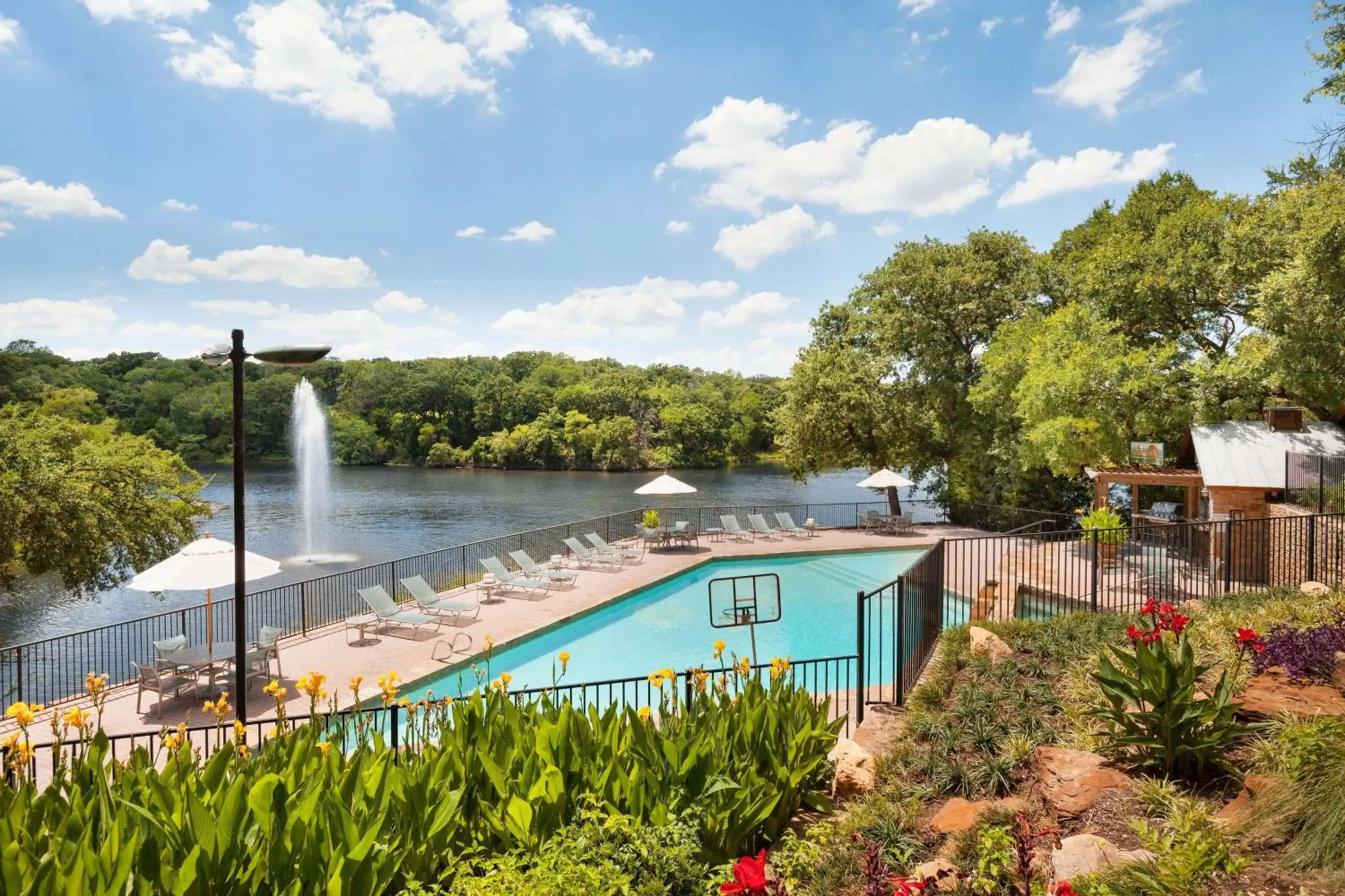 Property building, Swimming Pool in Hilton DFW Lakes Executive Conference Center