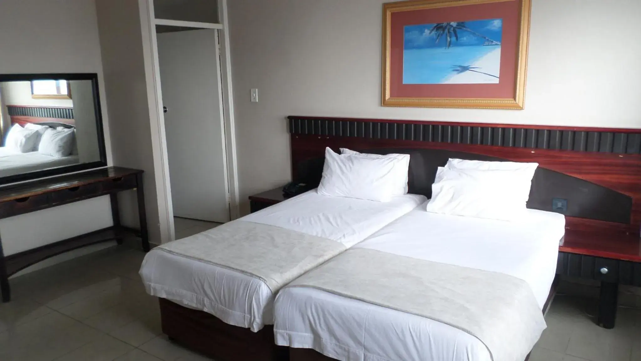 Bed in Coastlands Durban Self Catering Holiday Apartments