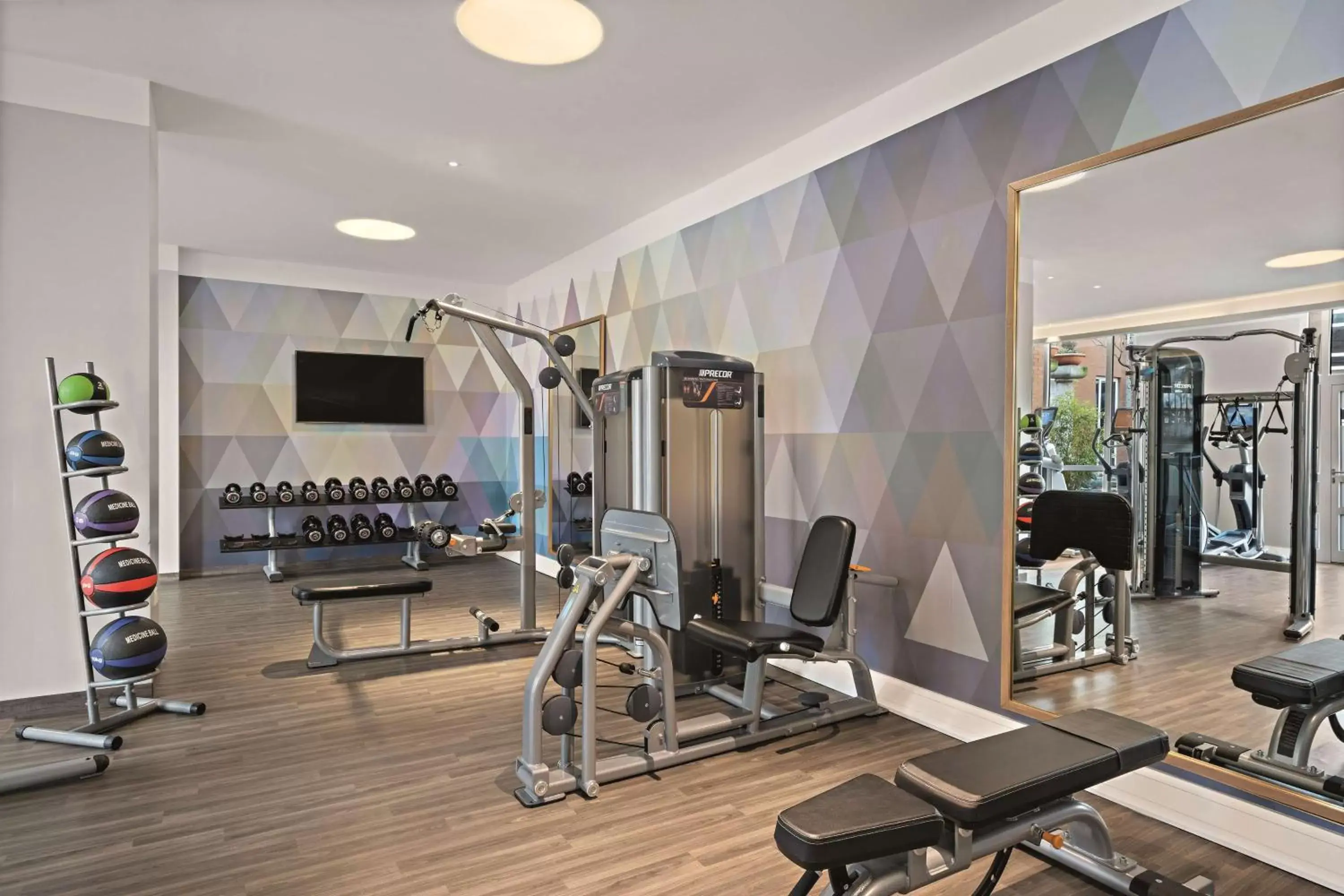 Fitness centre/facilities in Hilton Munich City Fitness centre/facilities in Hilton Munich City