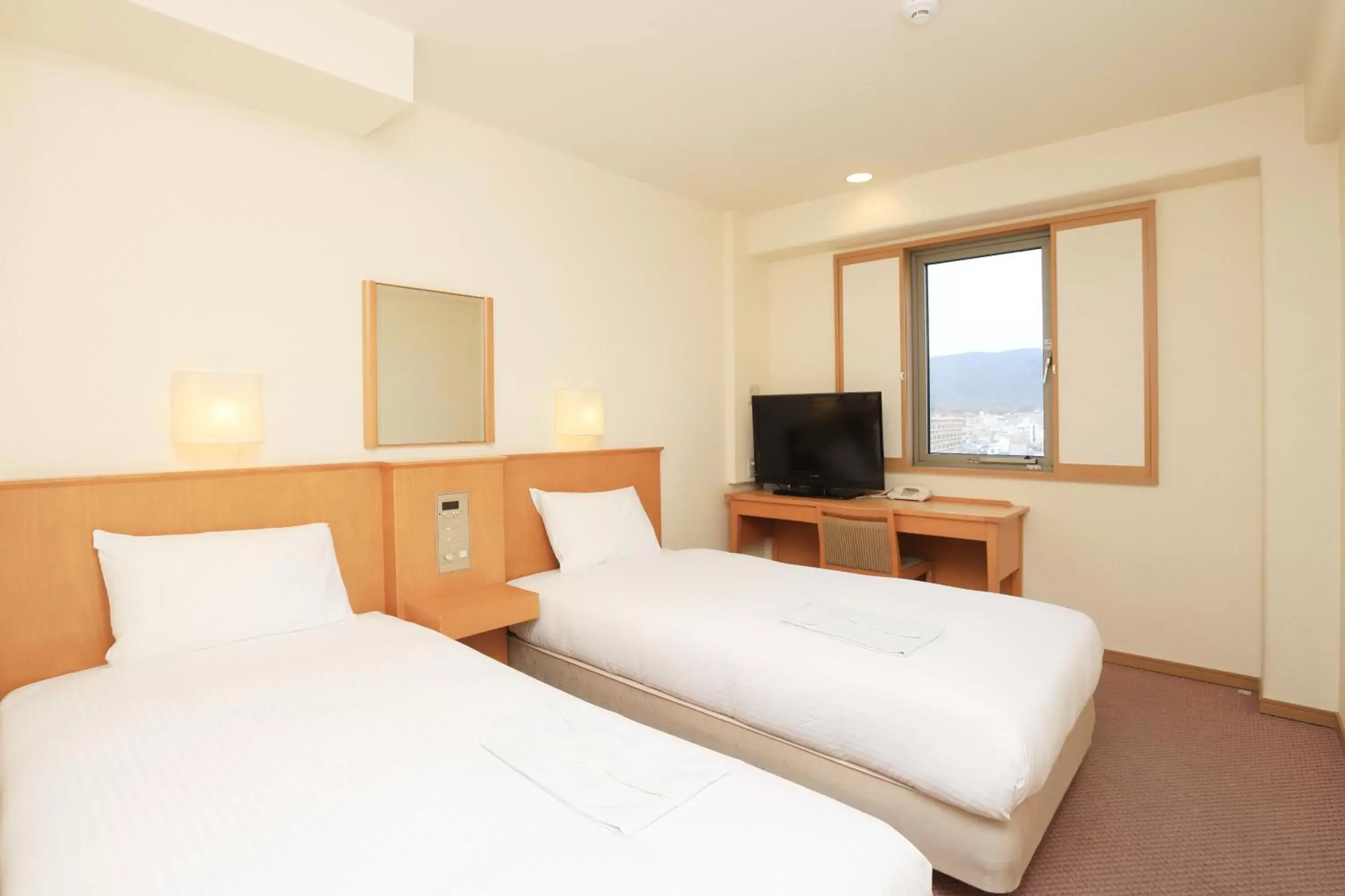 Bed in Smile Hotel Nara