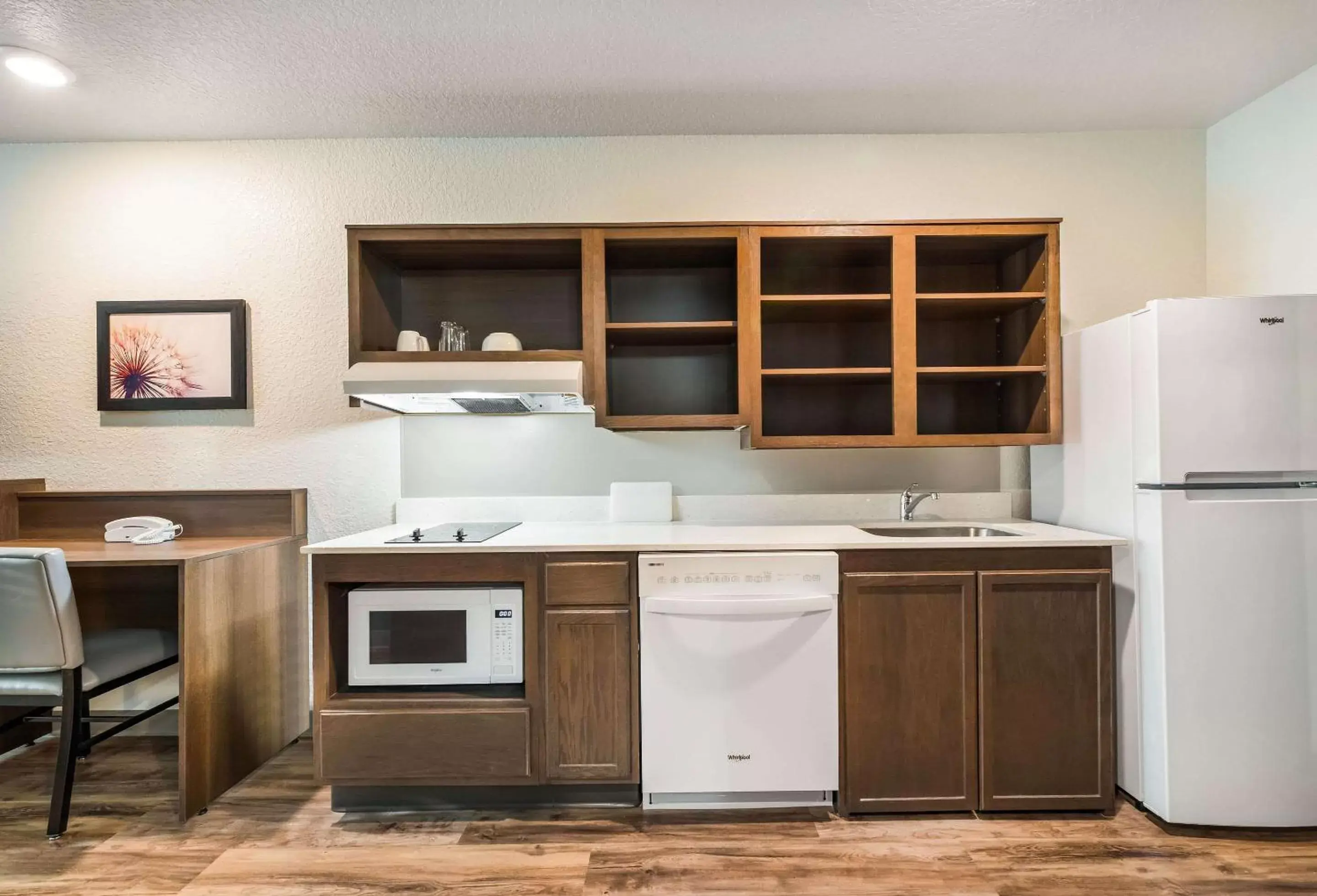 Photo of the whole room, Kitchen/Kitchenette in WoodSpring Suites Davenport FL