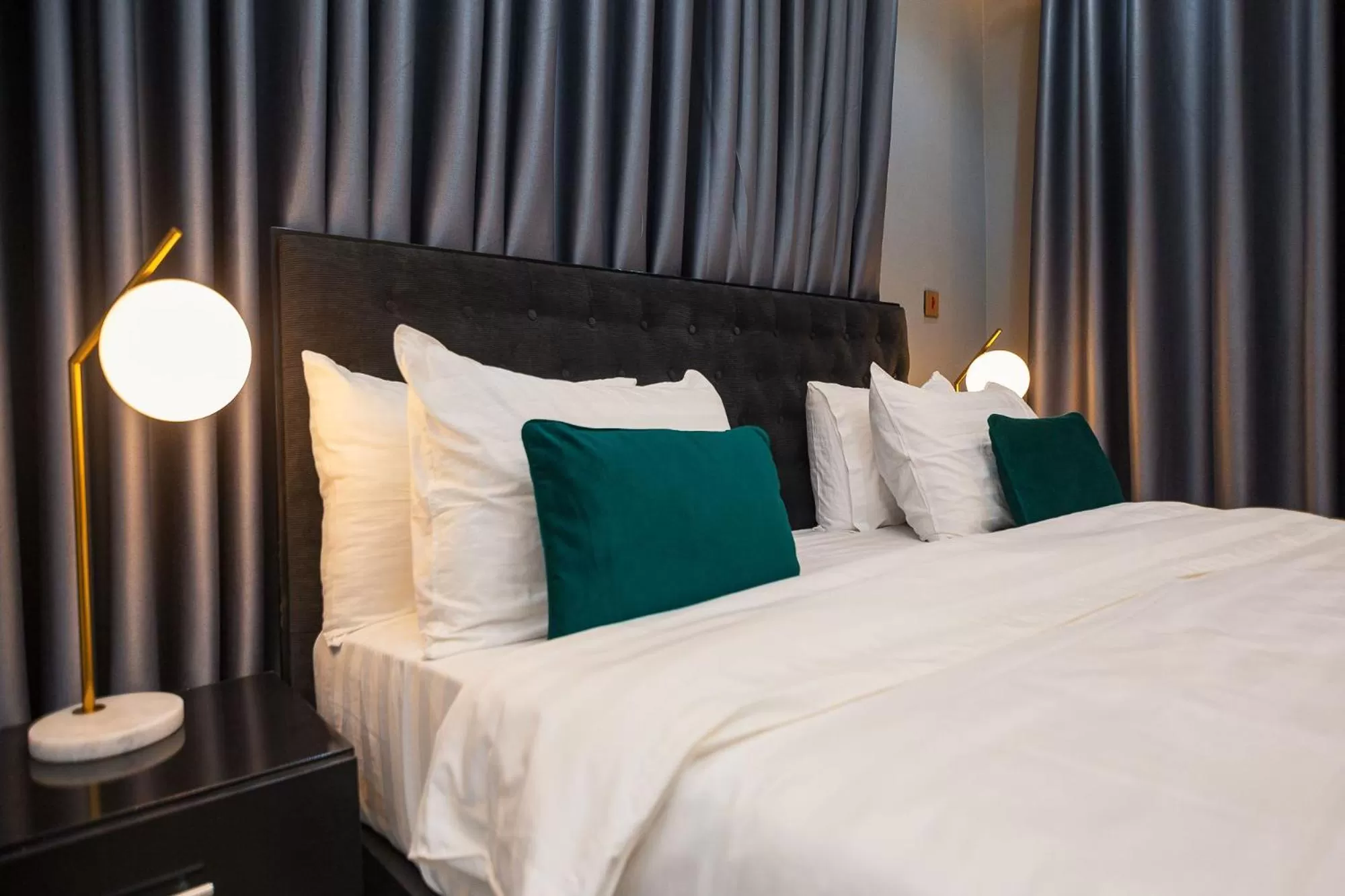 Bed in The Avery Suites, East Legon