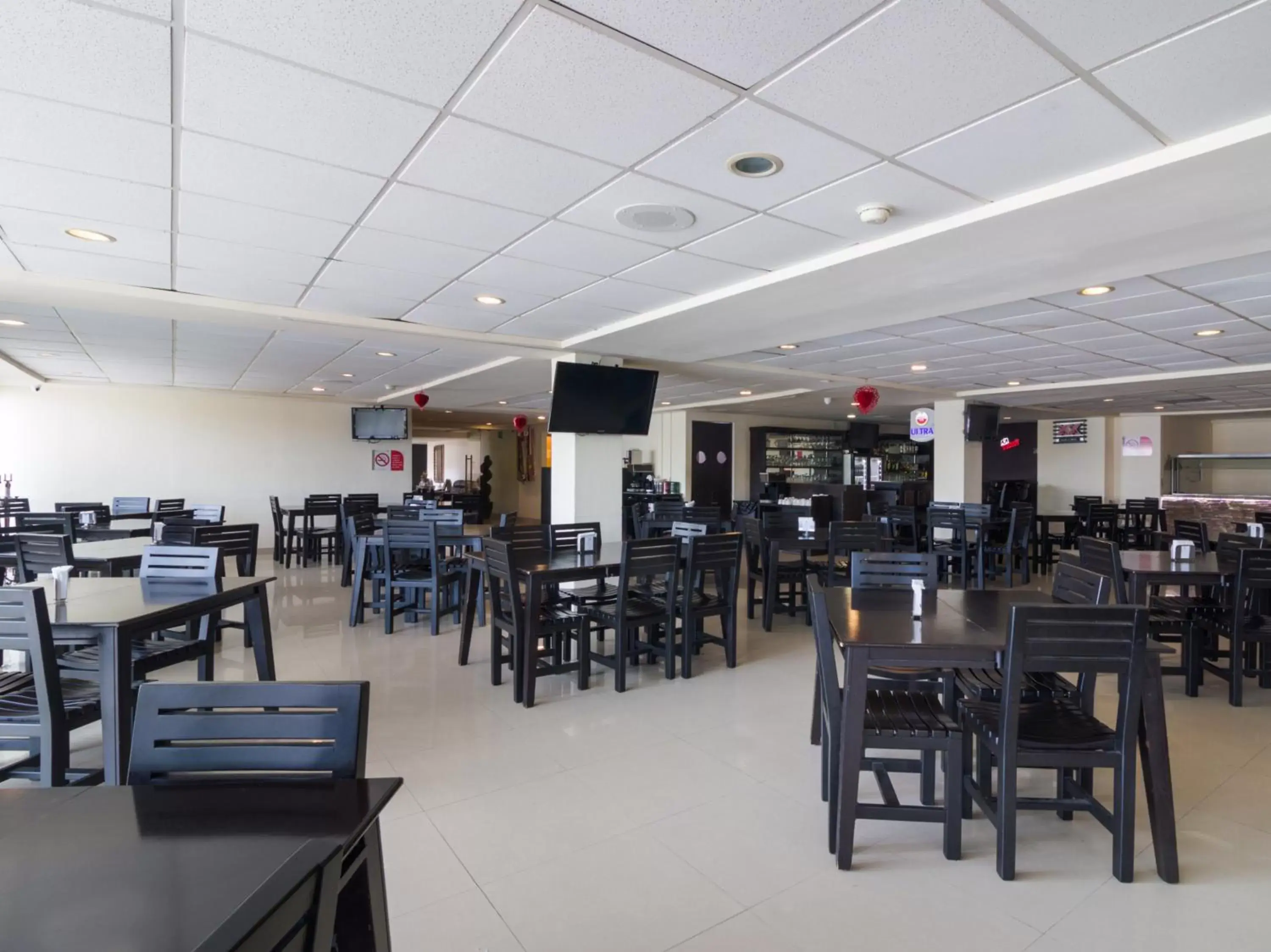 Restaurant/Places to Eat in Capital O Hotel Herederos, Piedras Negras