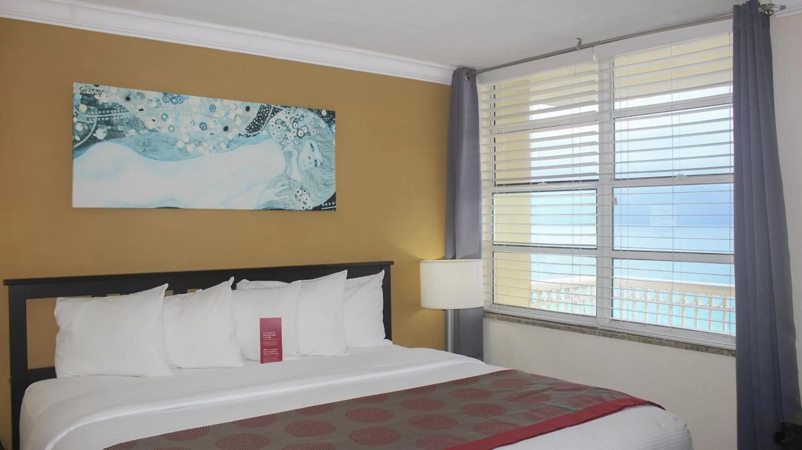 Bed in Ramada Plaza by Wyndham Marco Polo Beach Resort