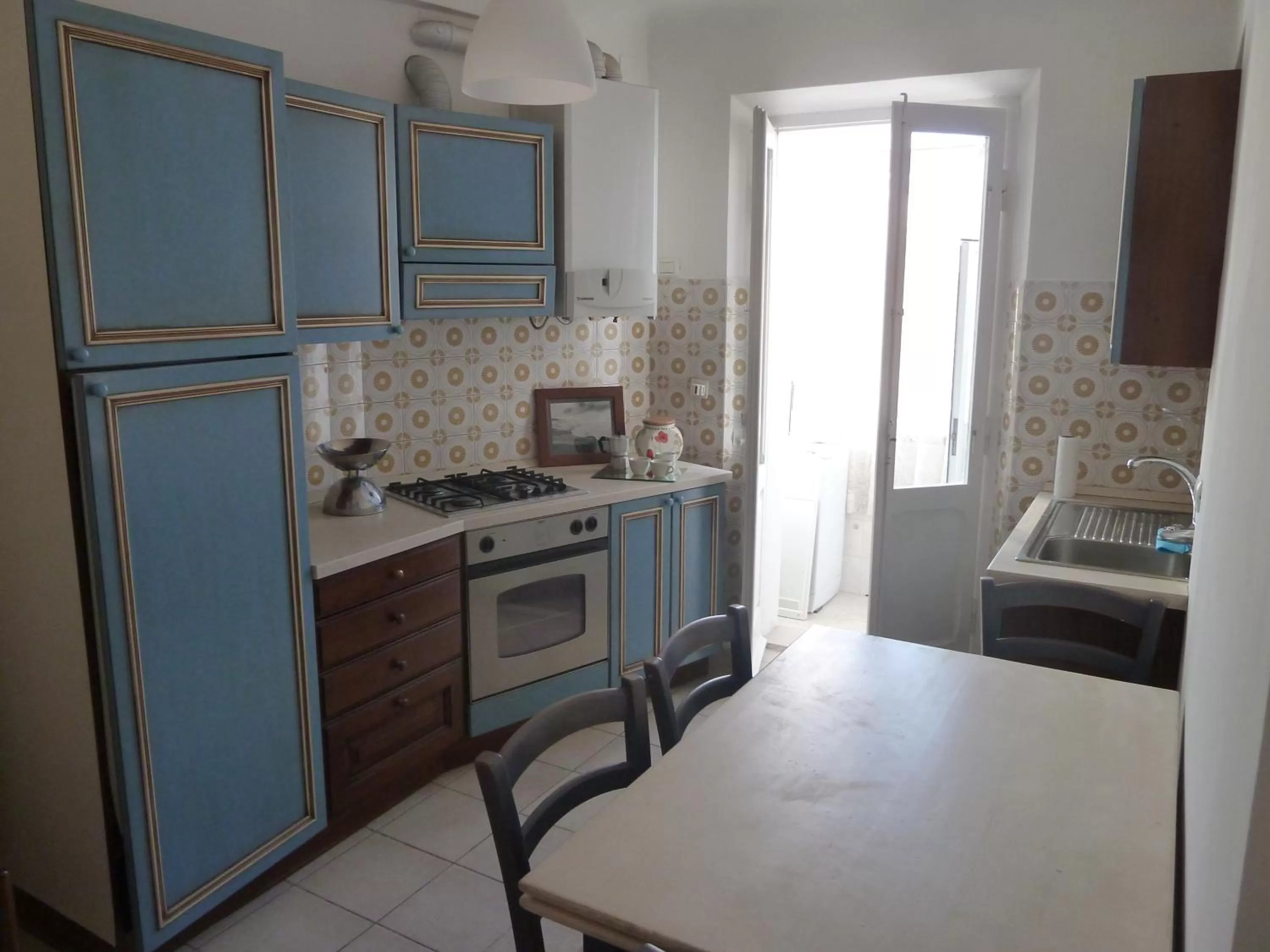 Kitchen or kitchenette in B & B da Maria