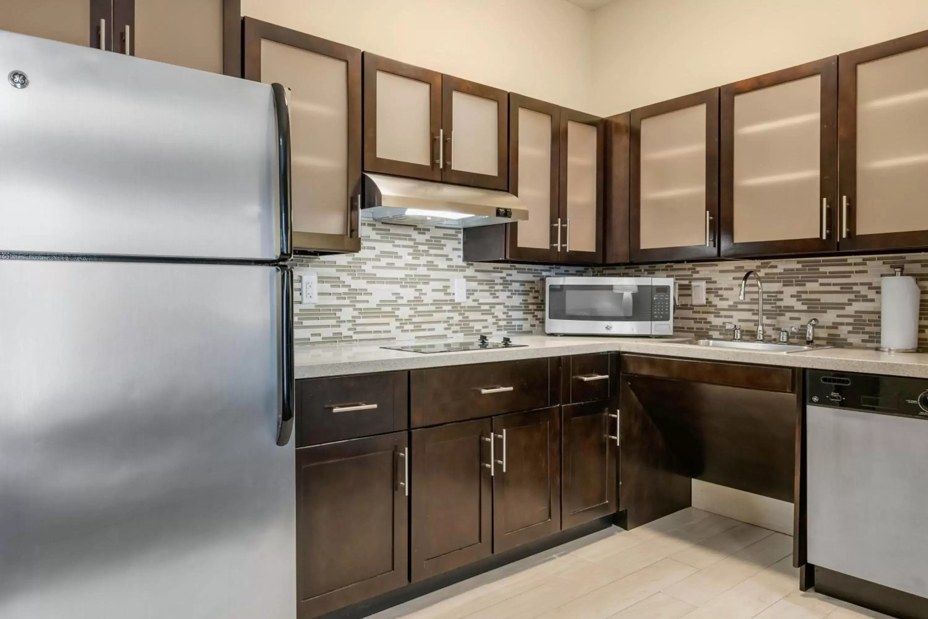 Kitchen/Kitchenette in Staybridge Suites St. Petersburg FL, an IHG Hotel