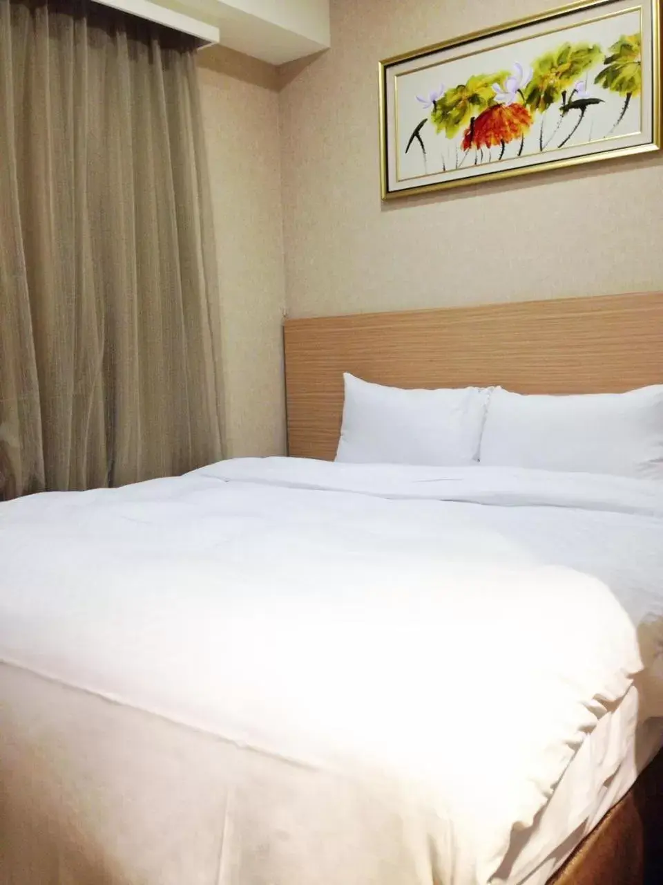 Bed in The Metro Hotel Taichung