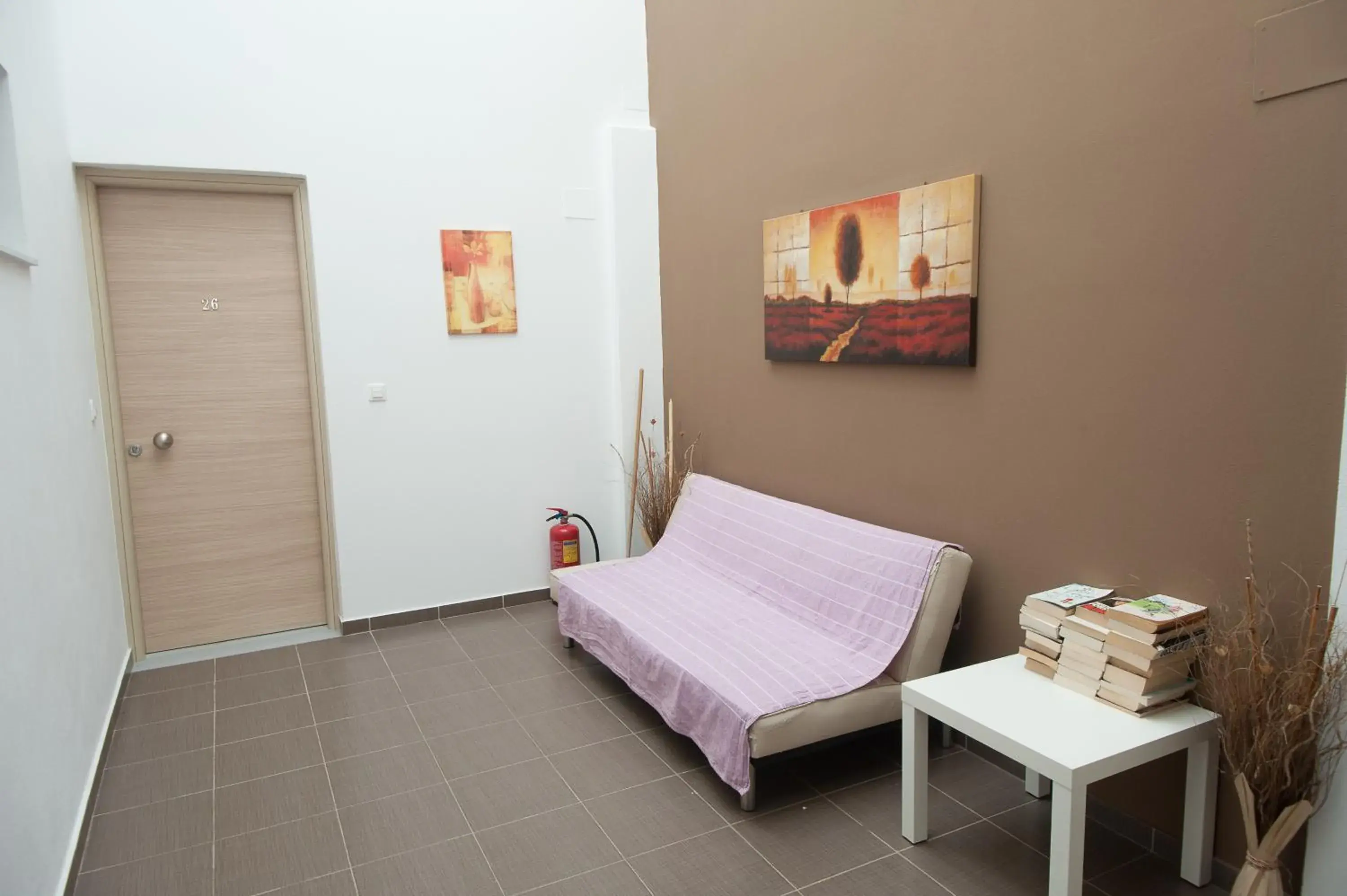 Seating area, Bed in Elounda Sunrise Apartments