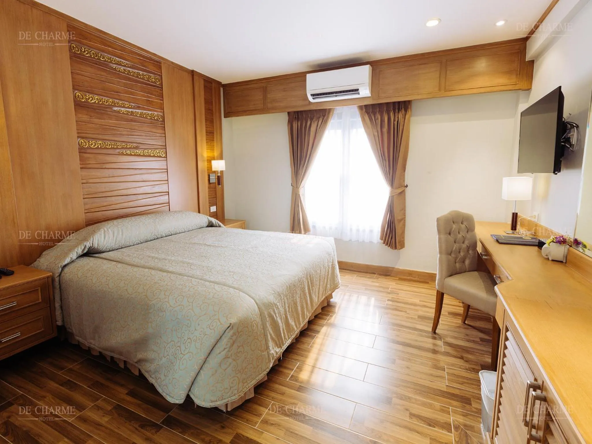 Photo of the whole room, Bed in Decharme Hotel