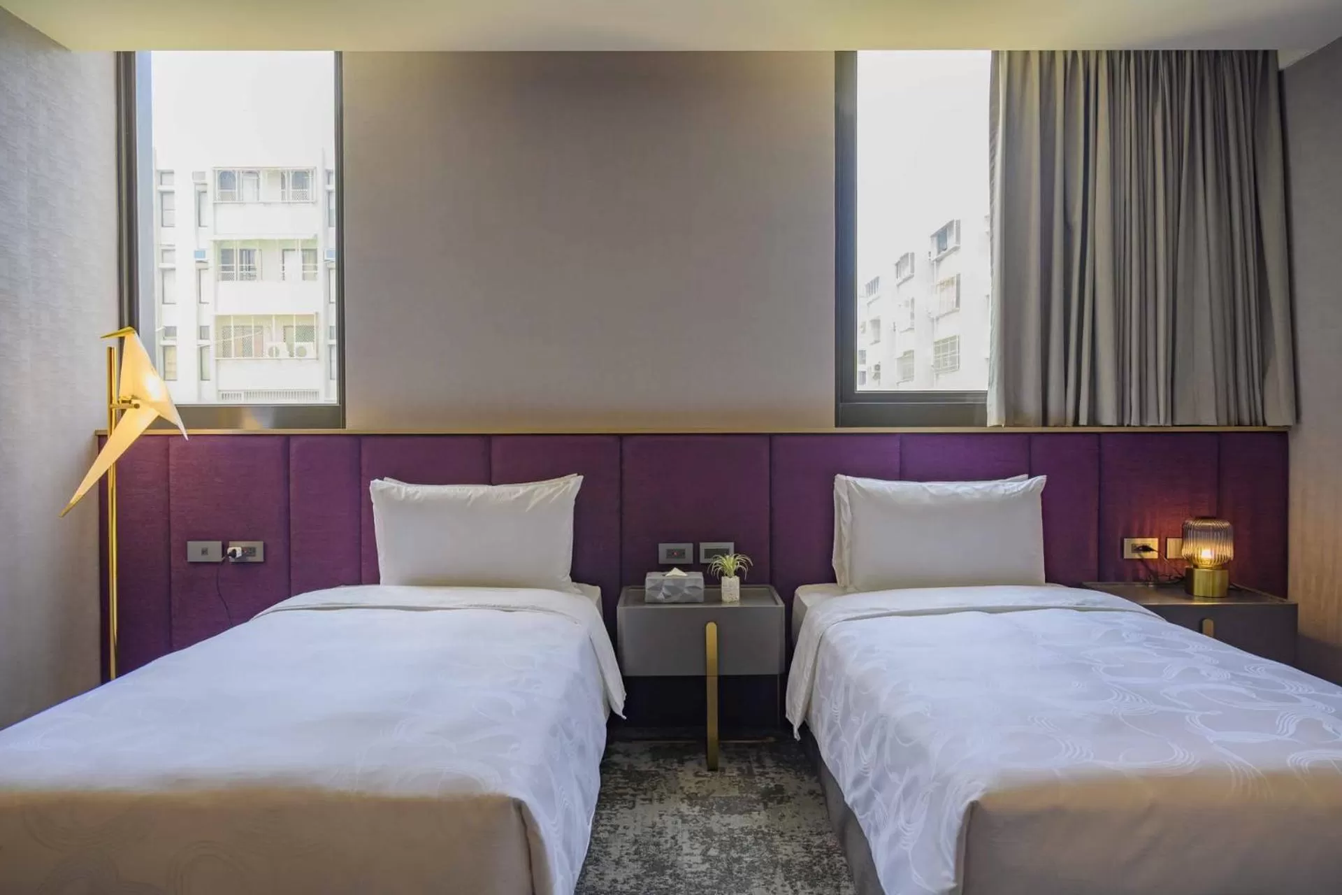 Bed in Tenz Go Hotel