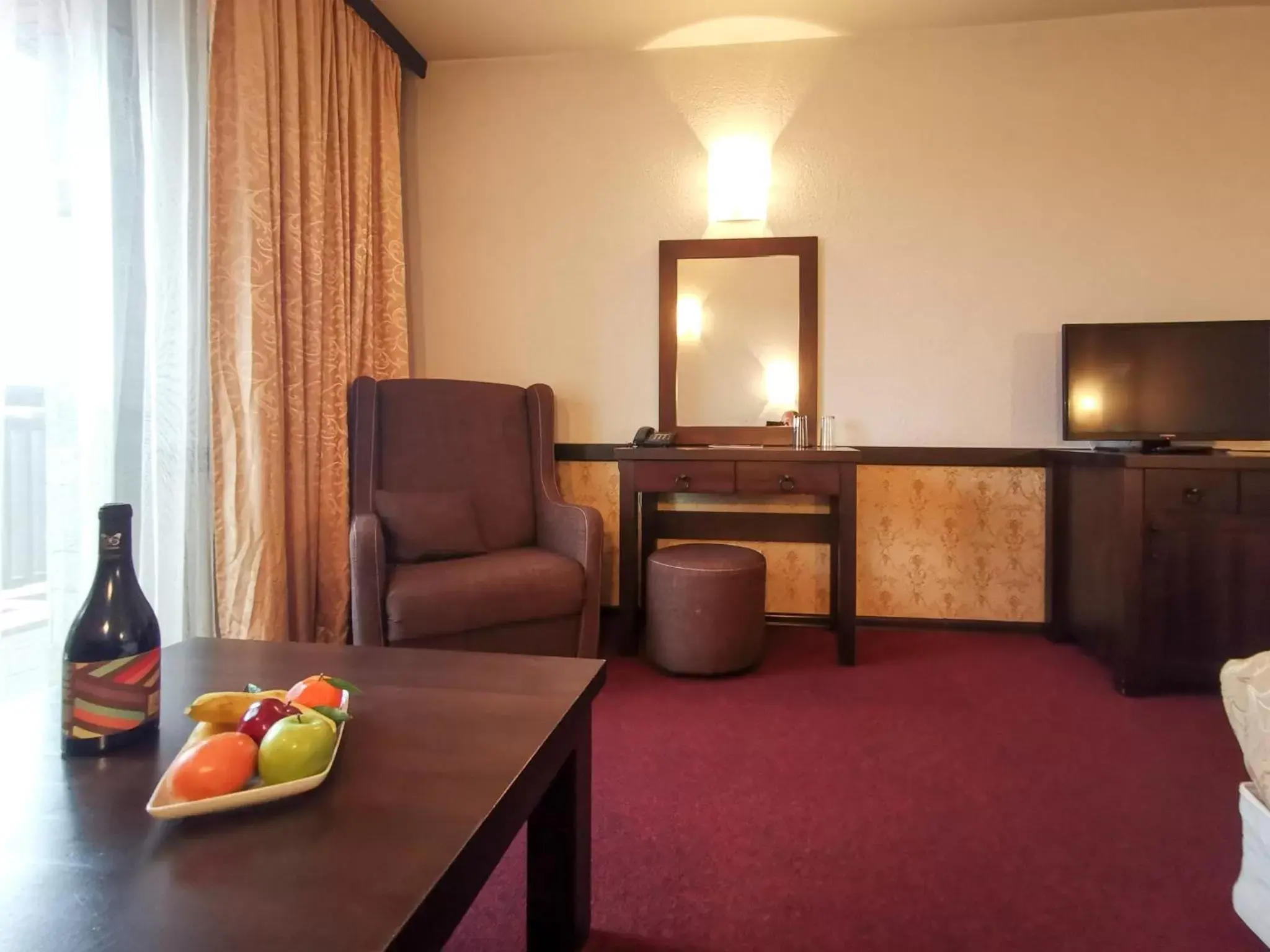 Photo of the whole room, TV/Entertainment Center in Trinity Residence Bansko