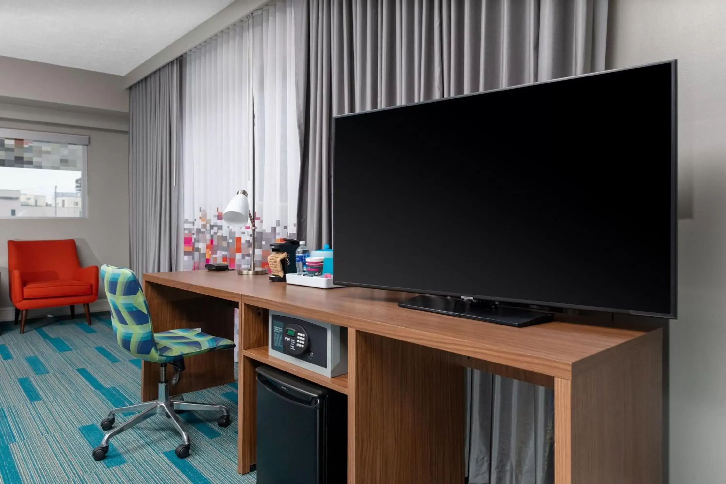 Photo of the whole room, TV/Entertainment Center in Aloft Nashville West End