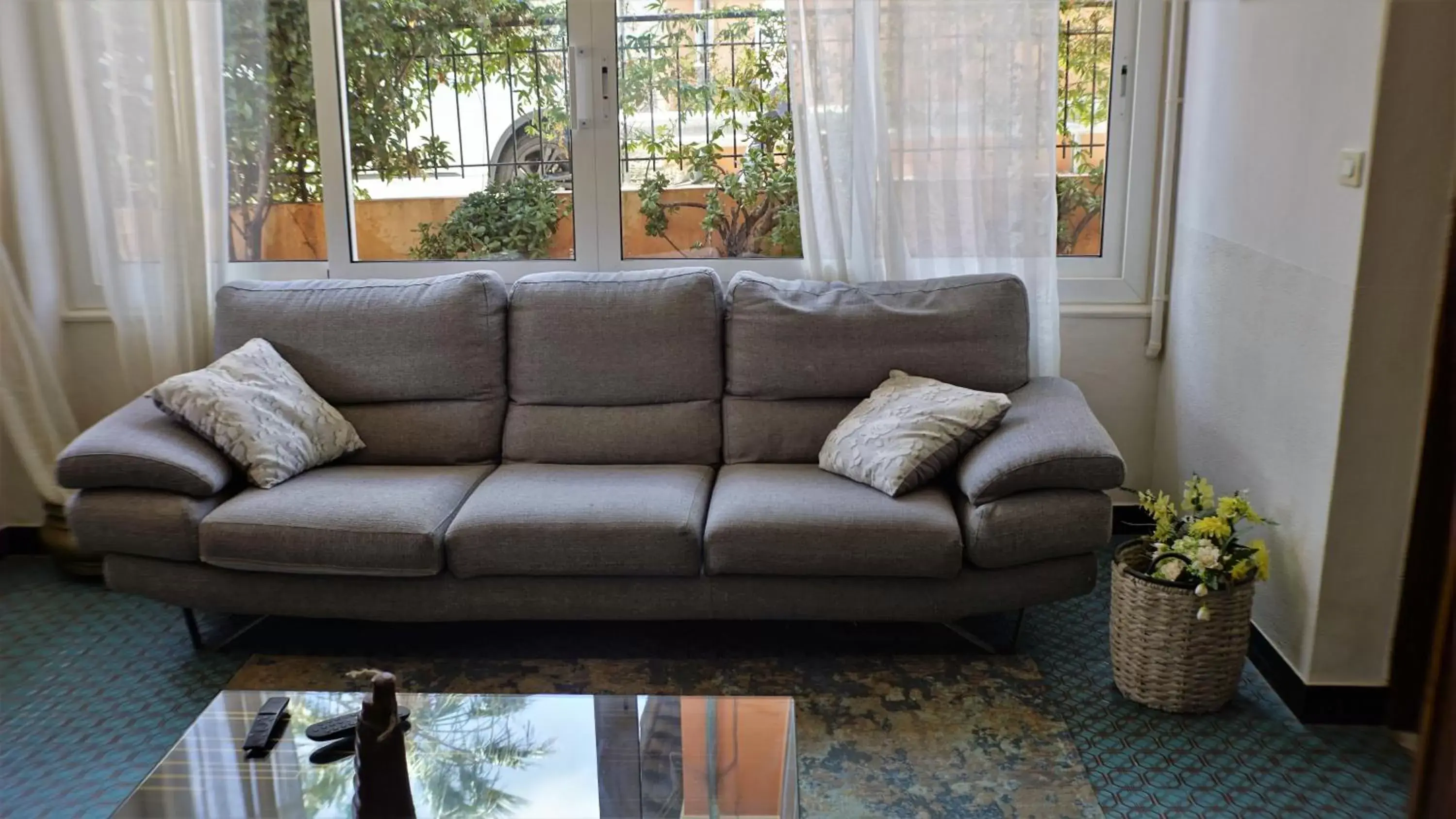 Communal lounge/ TV room, Seating Area in Hotel Lora