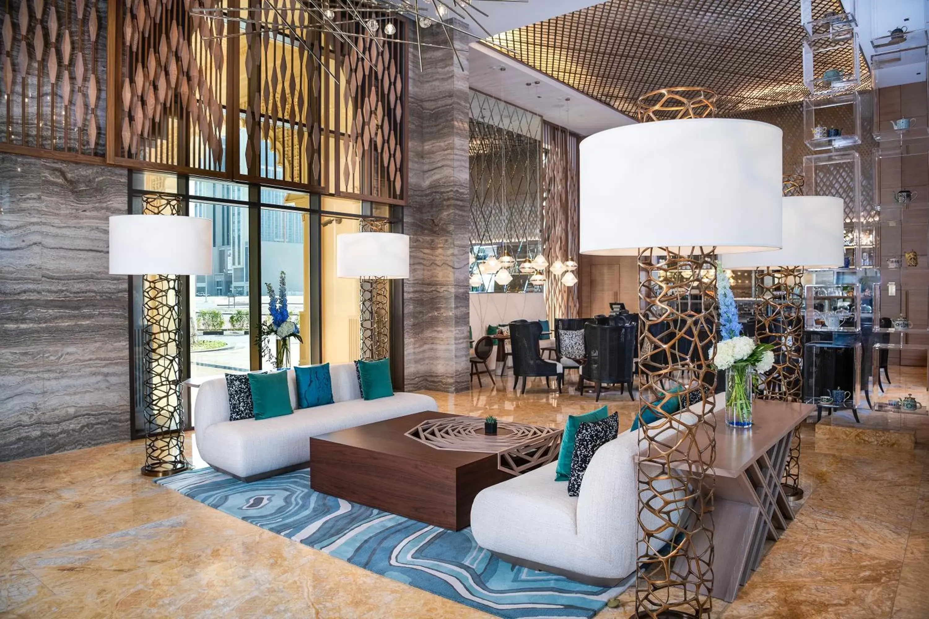 Lobby or reception in Al Jaddaf Rotana Suite Hotel