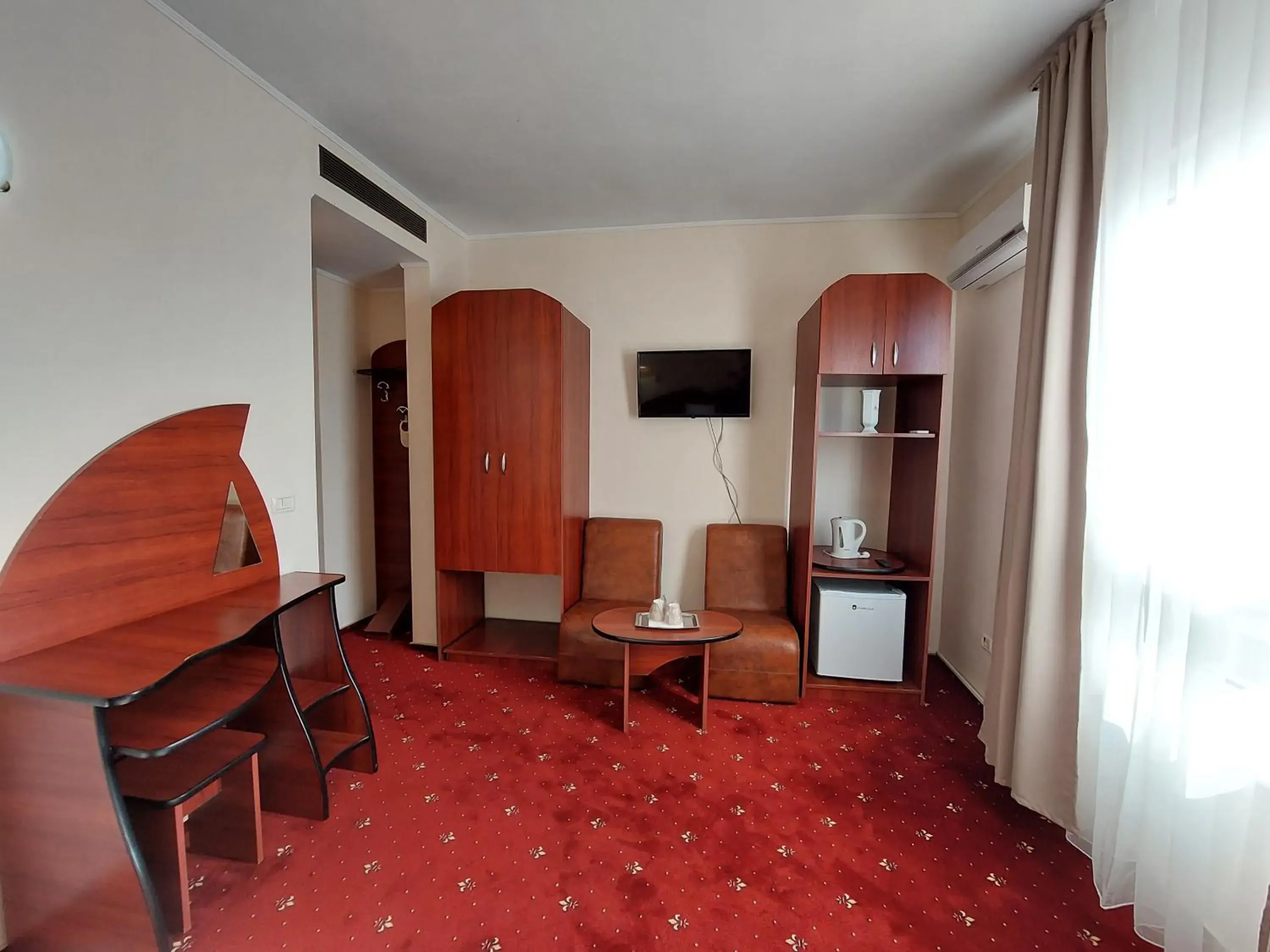 Bed, Seating Area in Hotel Egreta