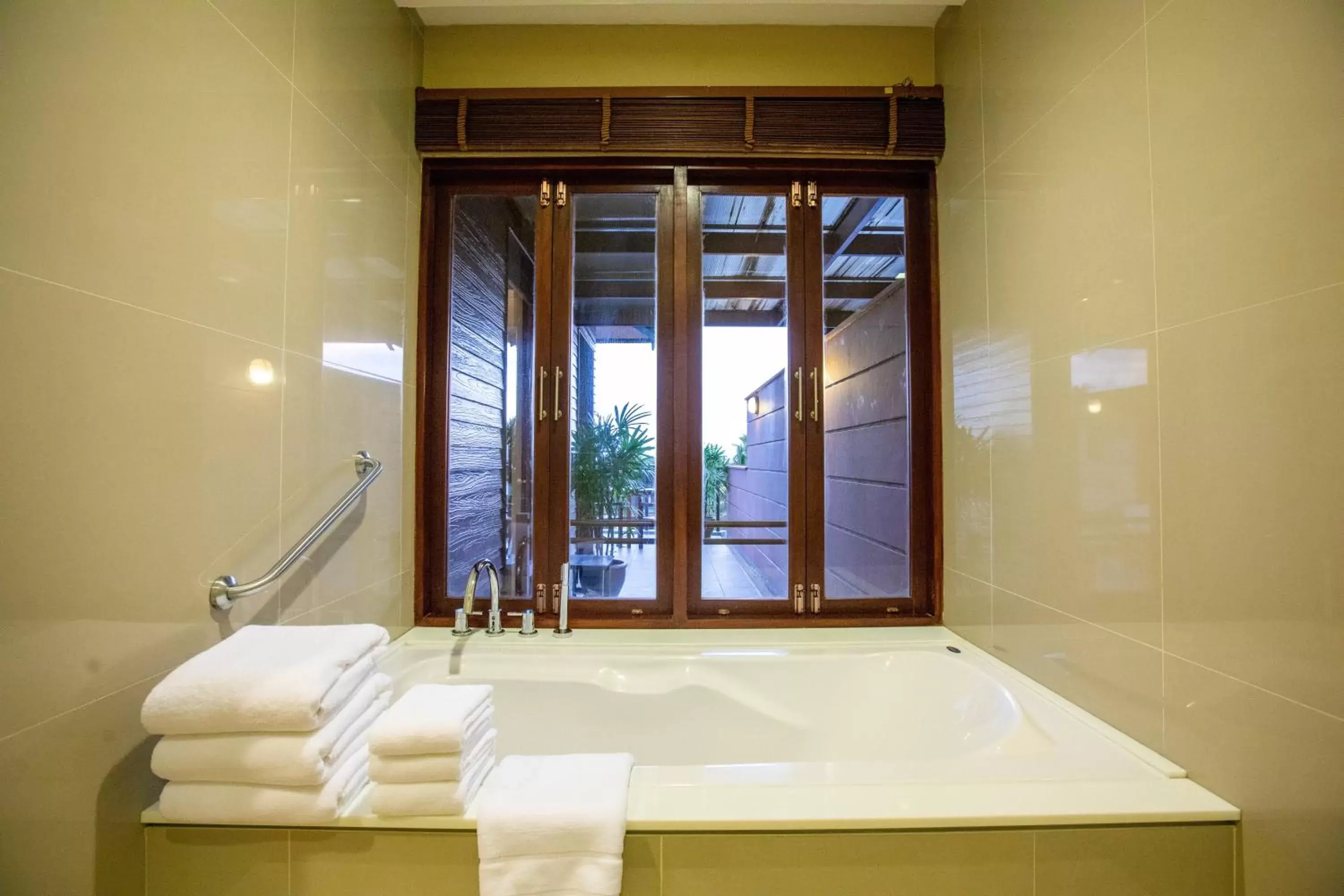 Photo of the whole room, Bathroom in Holiday Ao Nang Beach Resort, Krabi - SHA Extra Plus