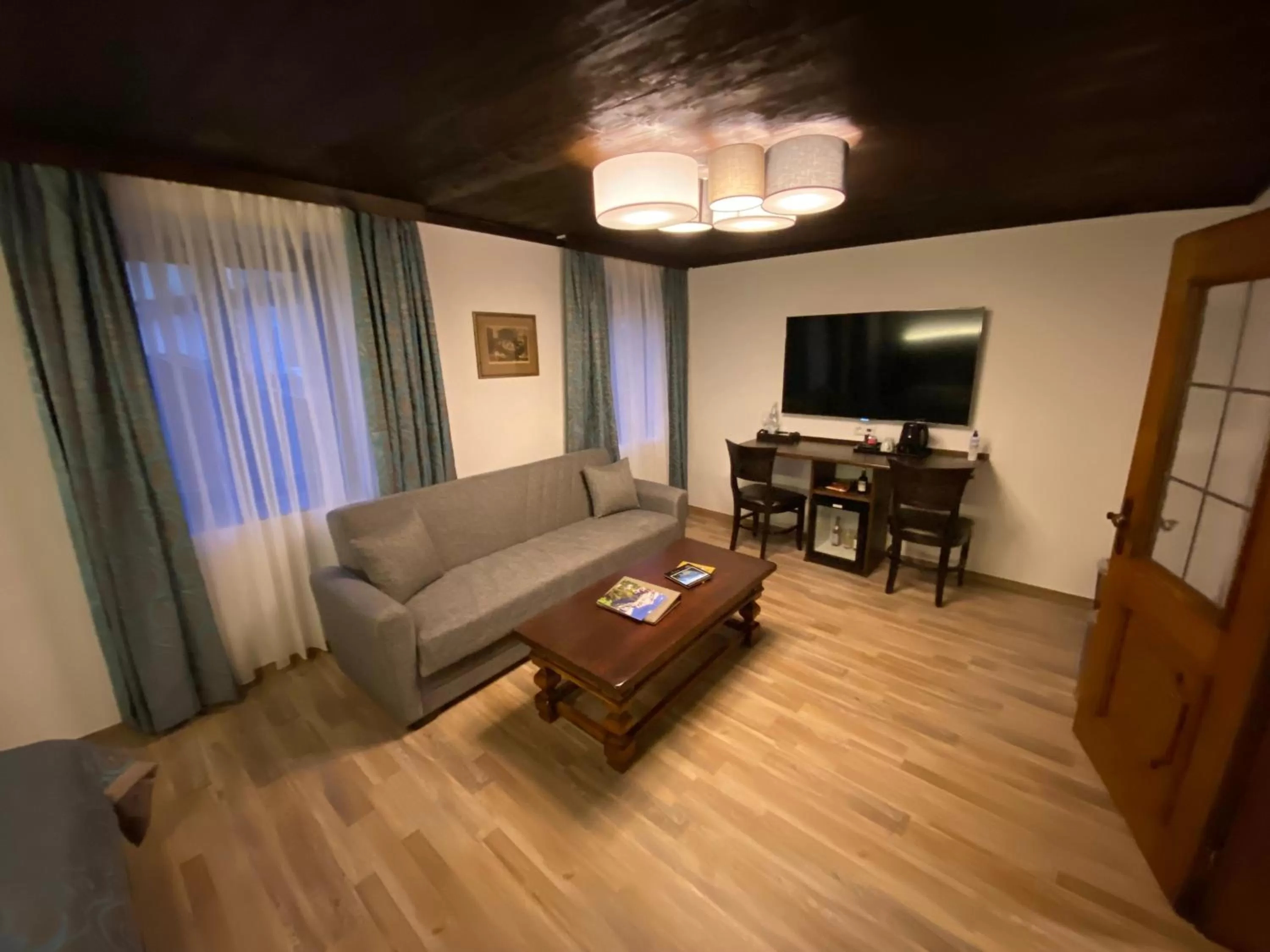 TV and multimedia, Seating Area in Atlas Posthotel