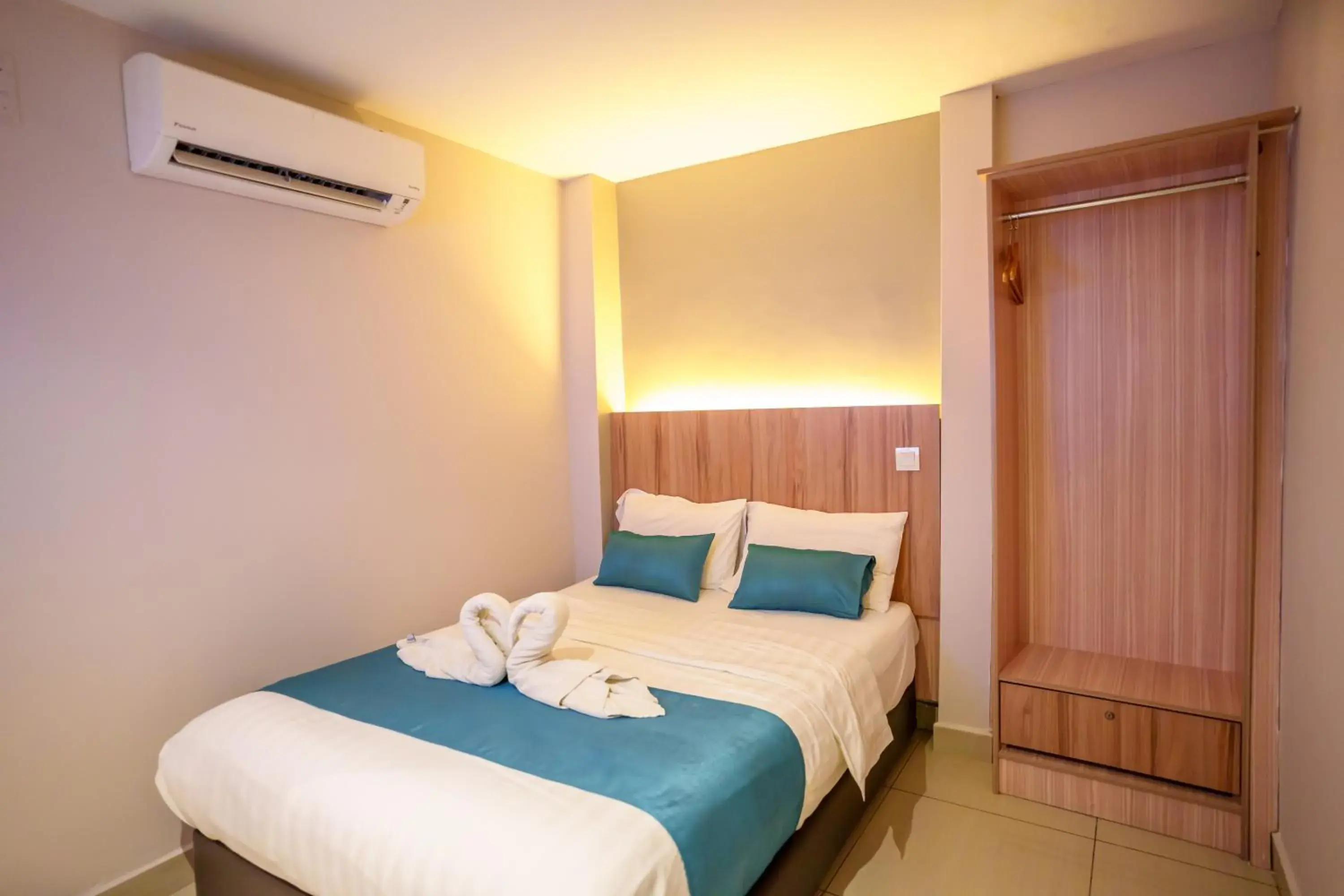 Bed in Alaxis Hotel Bed in Alaxis Hotel