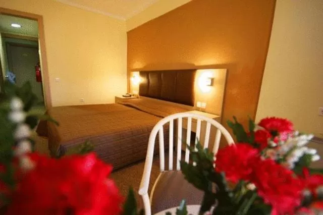 Bed in Orpheus Hotel