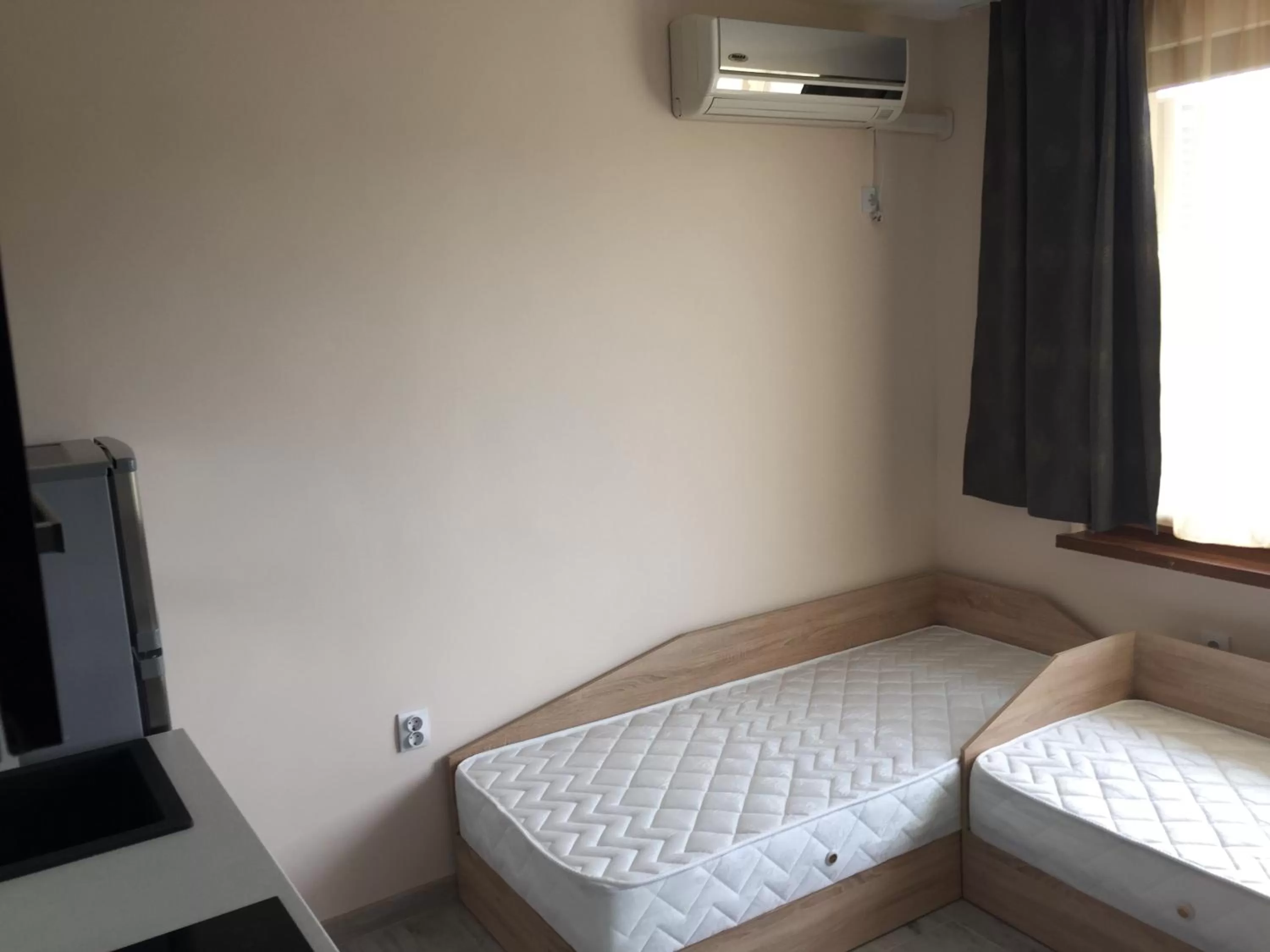 Bed in Family Hotel Malibu