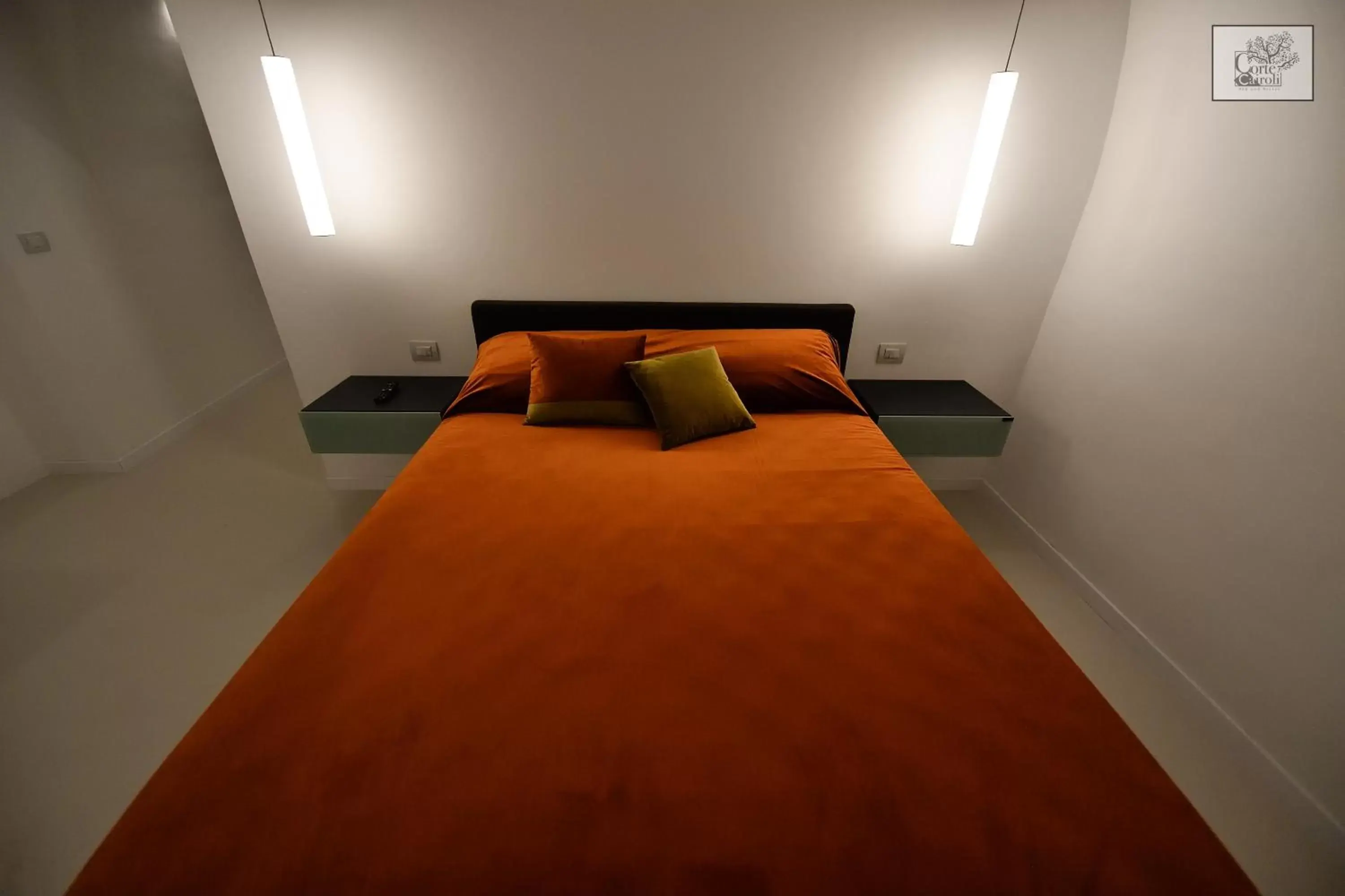 Bed in Corte Cairoli B&B and Suites