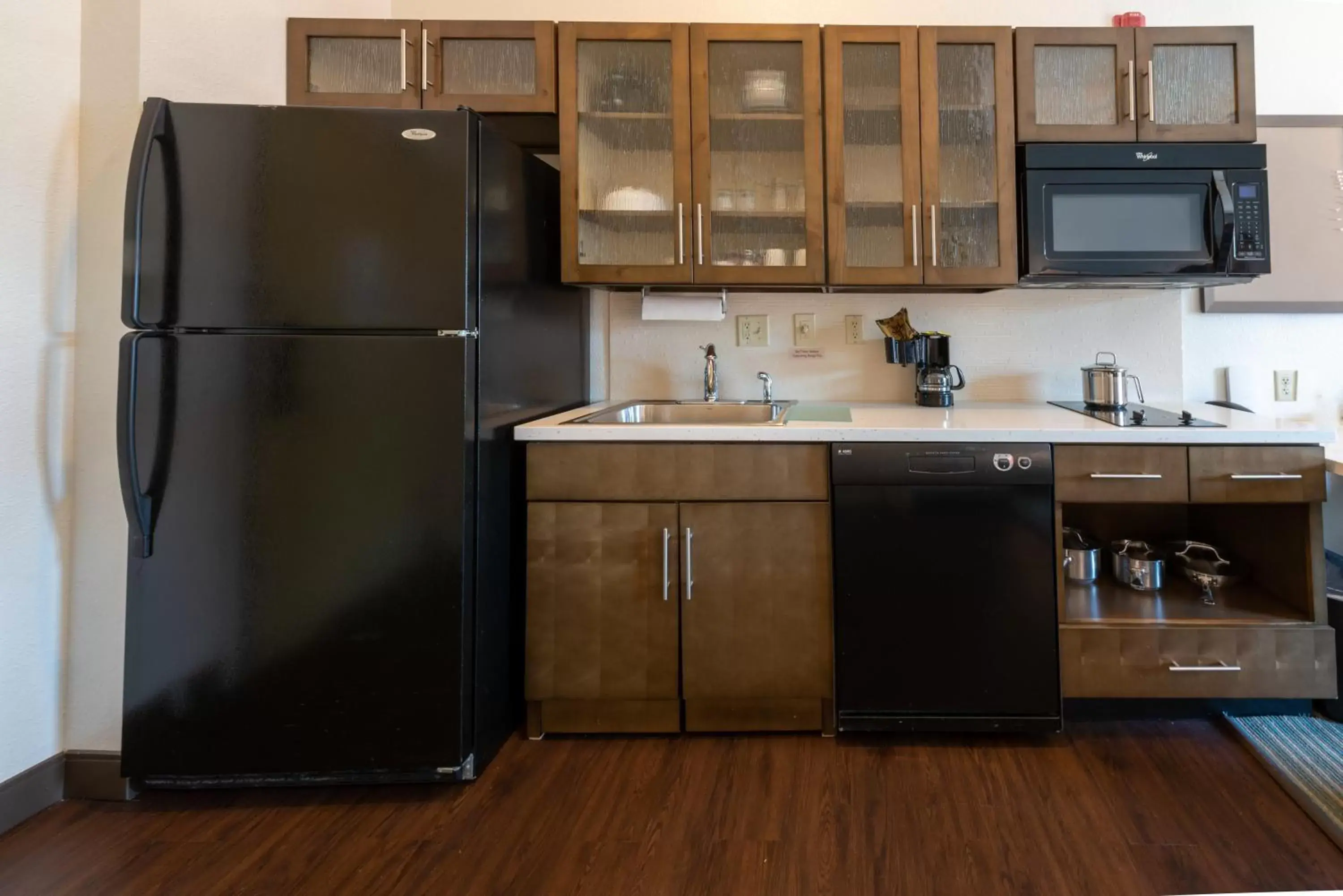 Bedroom, Kitchen/Kitchenette in Candlewood Suites-West Springfield, an IHG Hotel