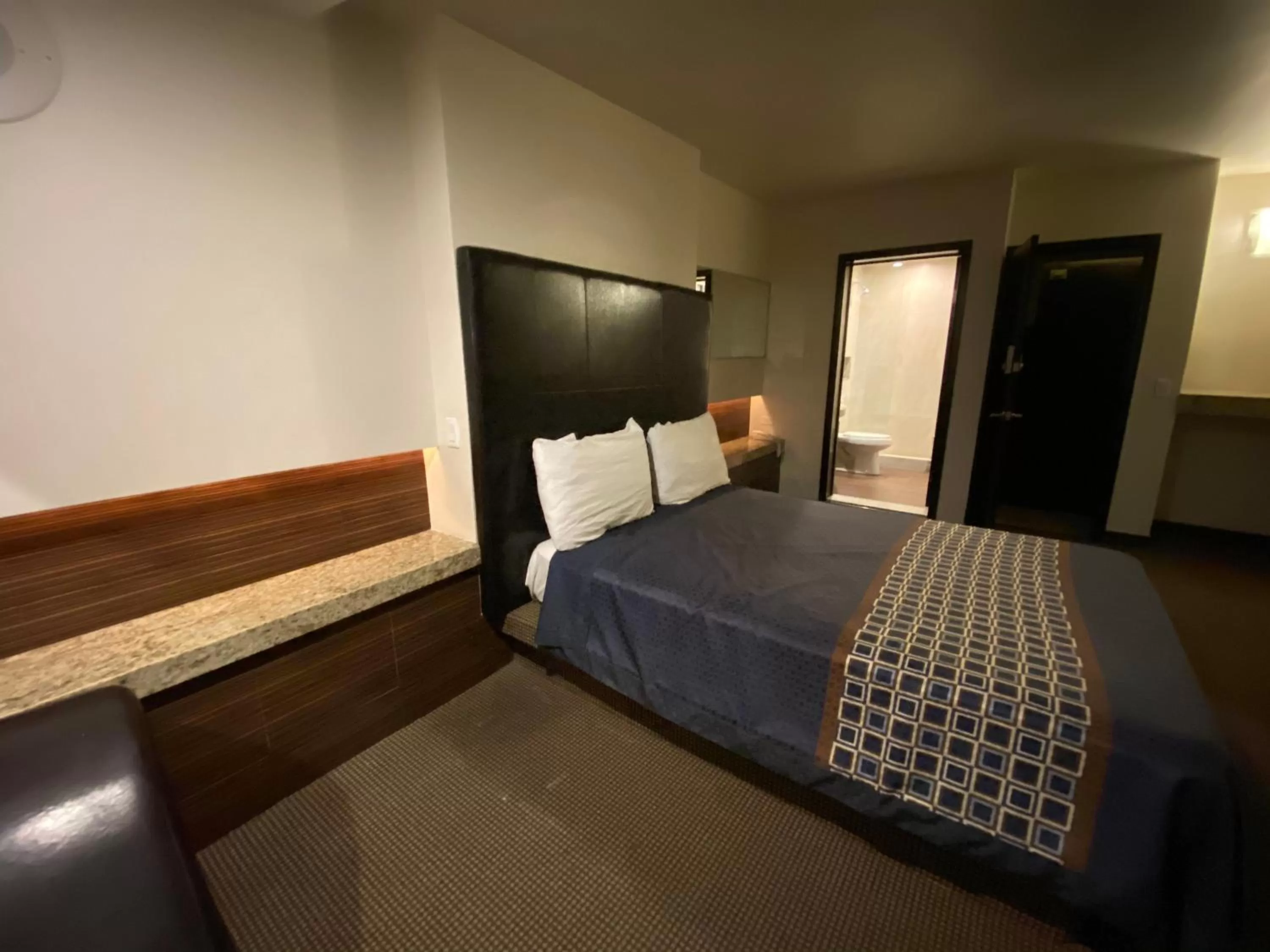 Bed in Motel Encuentro