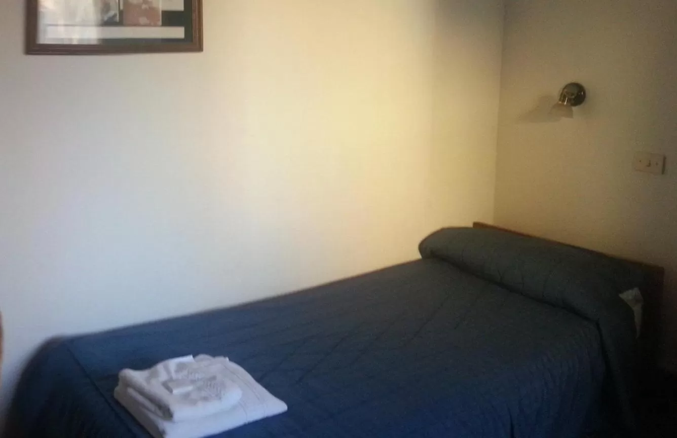 Bed in Hostería Chimehuin