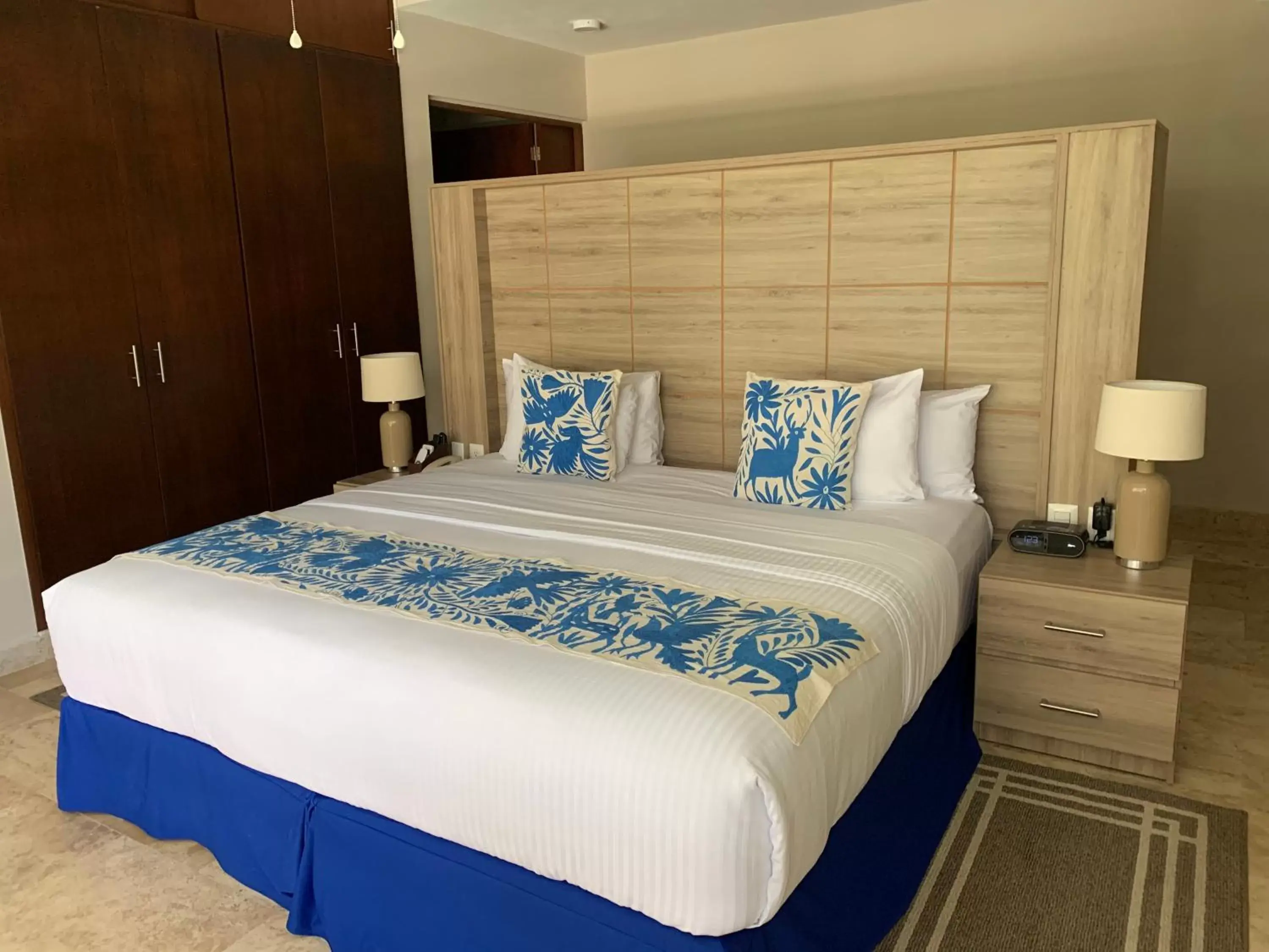 Bed in Xaha Villas Suites & Golf Resort