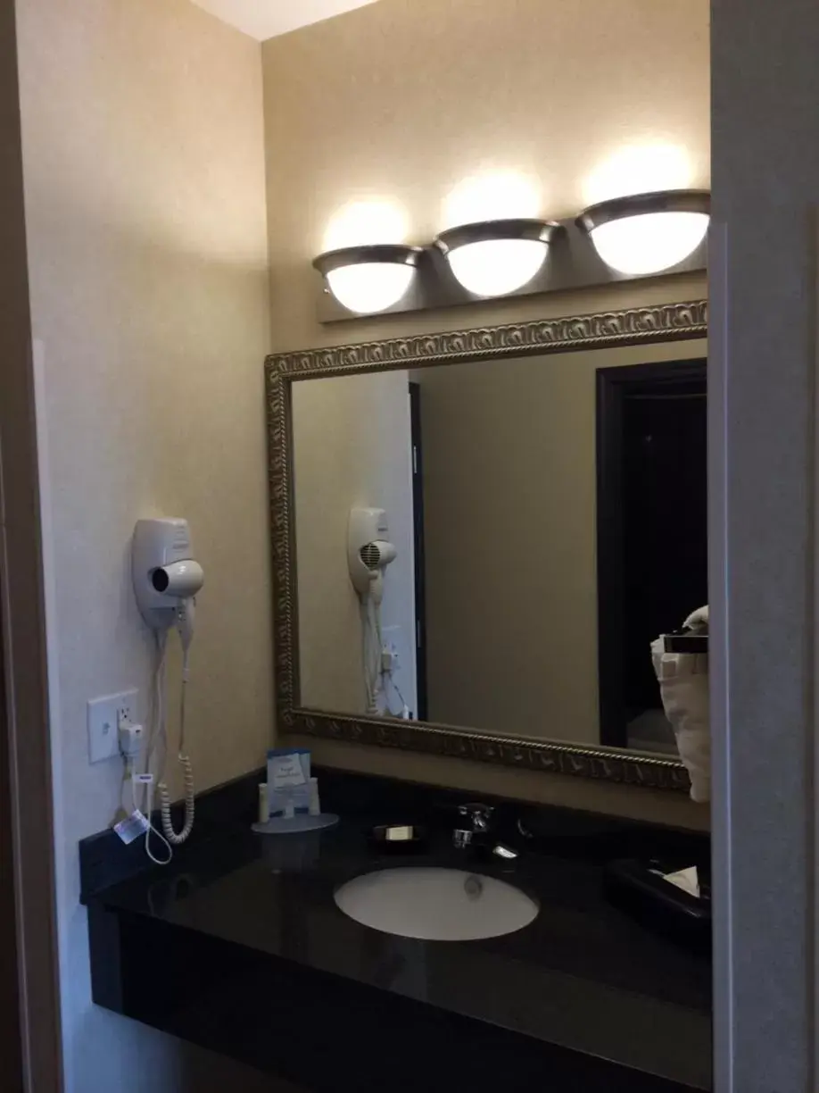 Bathroom in Baymont by Wyndham Henderson Bathroom in Baymont by Wyndham Henderson