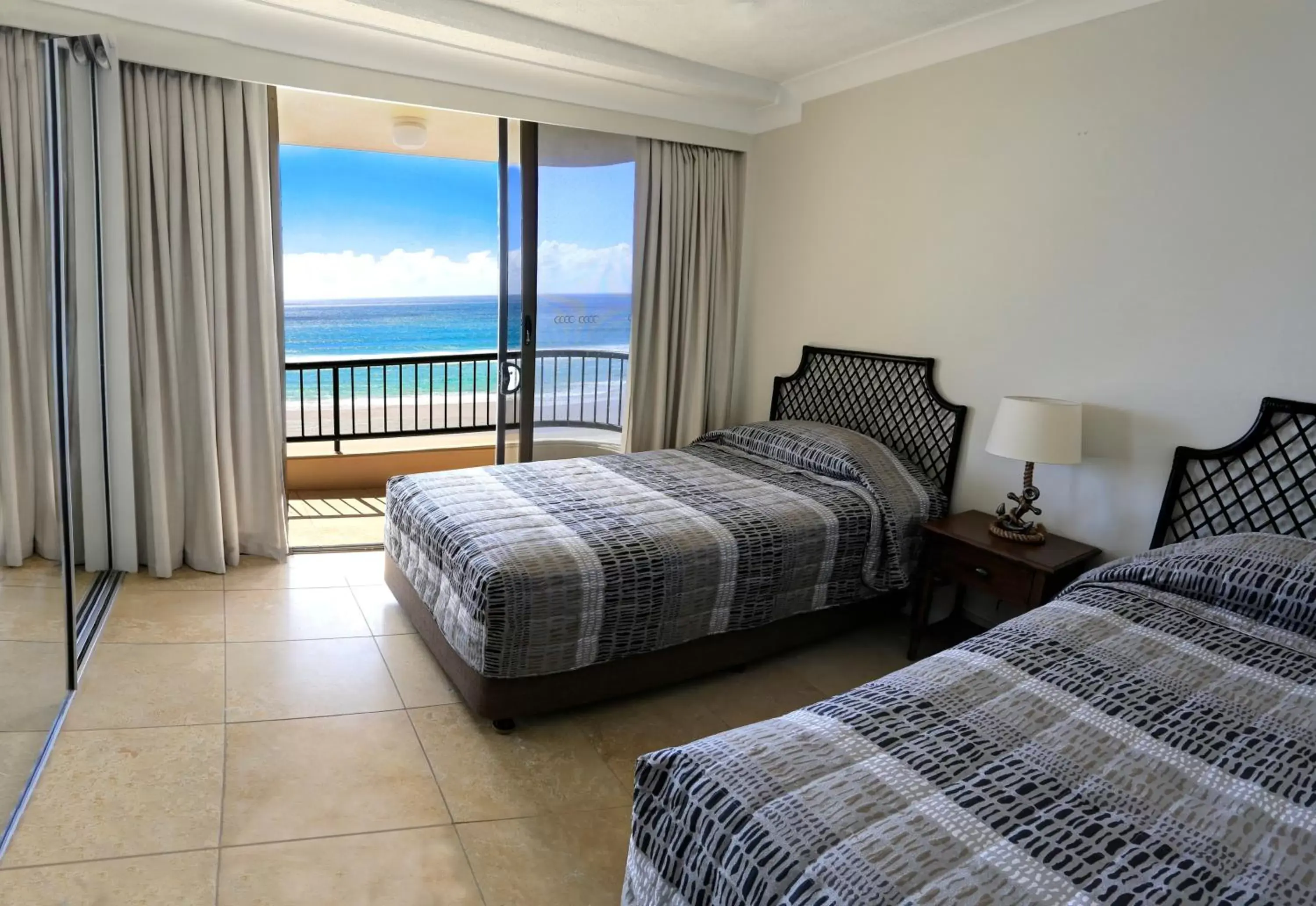 Balcony/Terrace, Bed in Pelican Sands Beach Resort