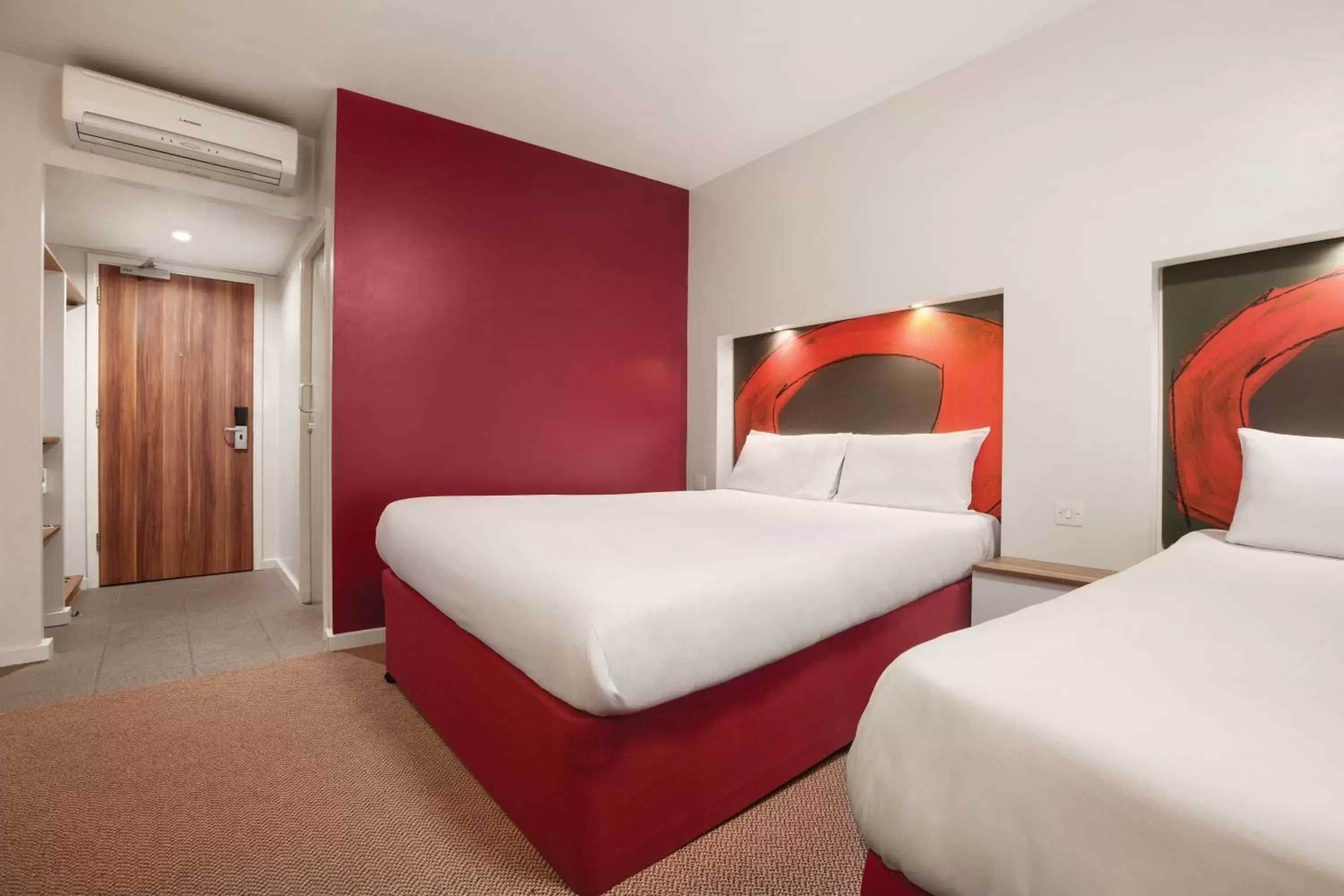 Bed in Ramada London Stansted Airport