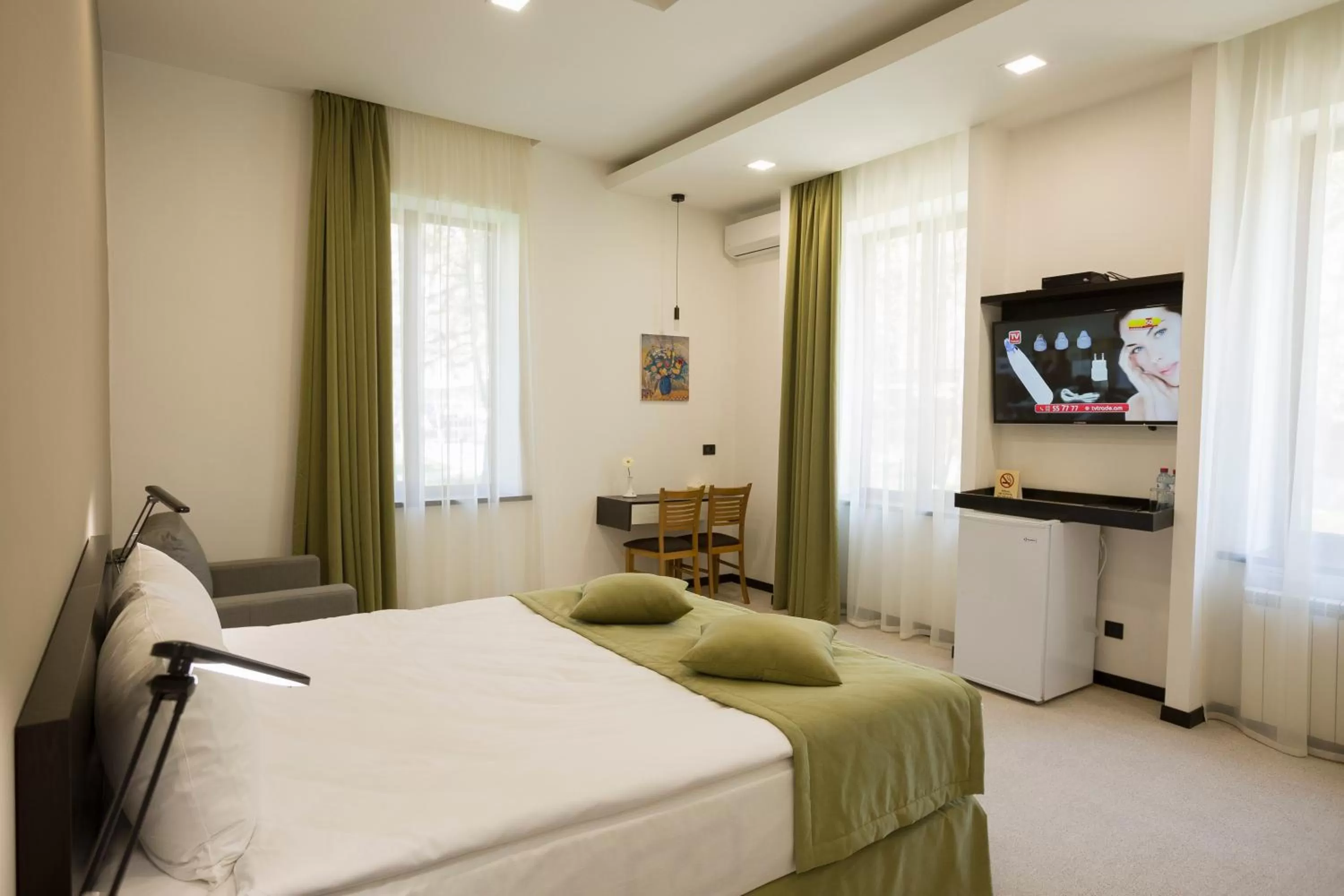 Bed in AnnaBella Boutique Hotel