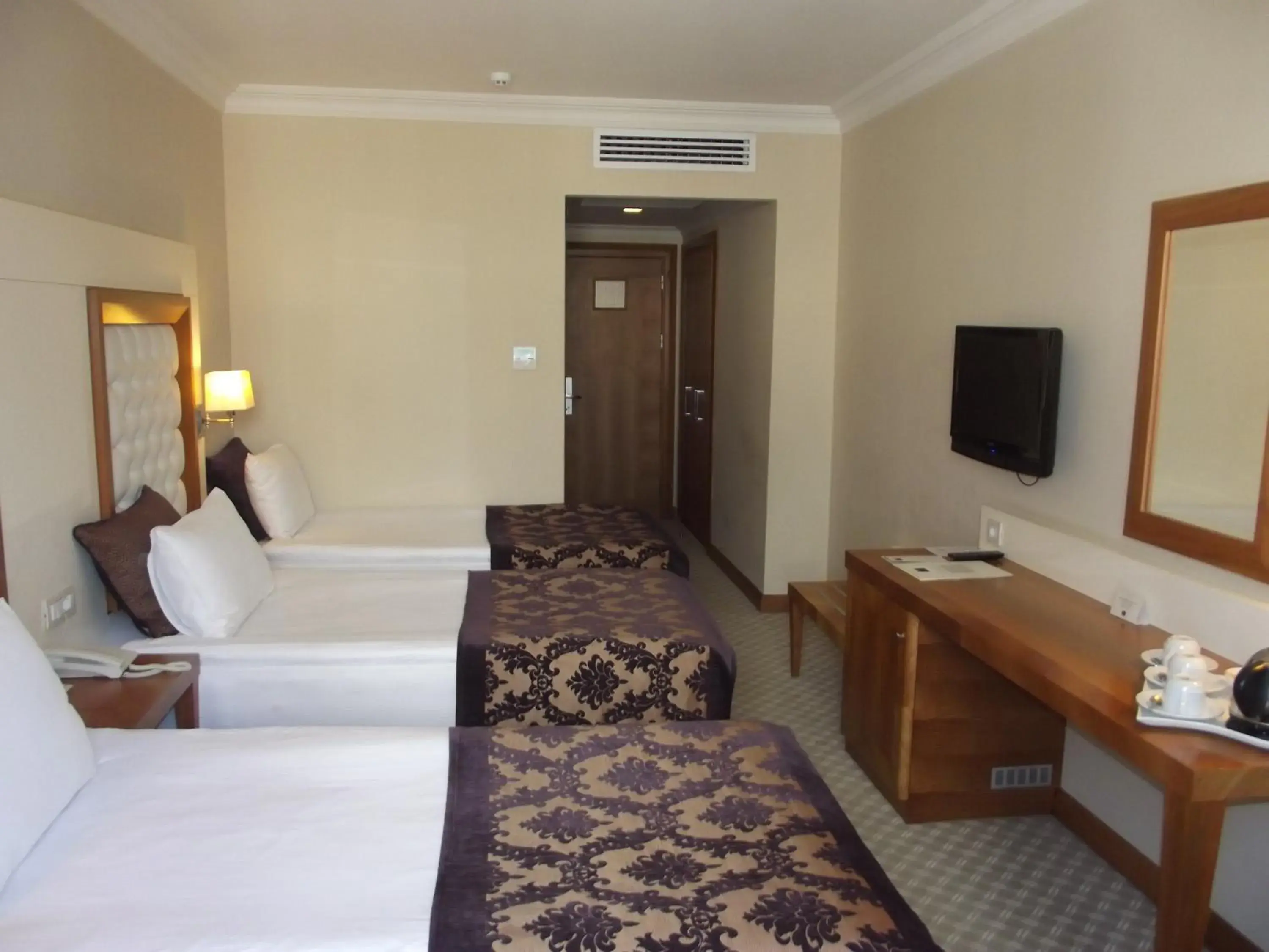 Bed in Tugcu Hotel Select