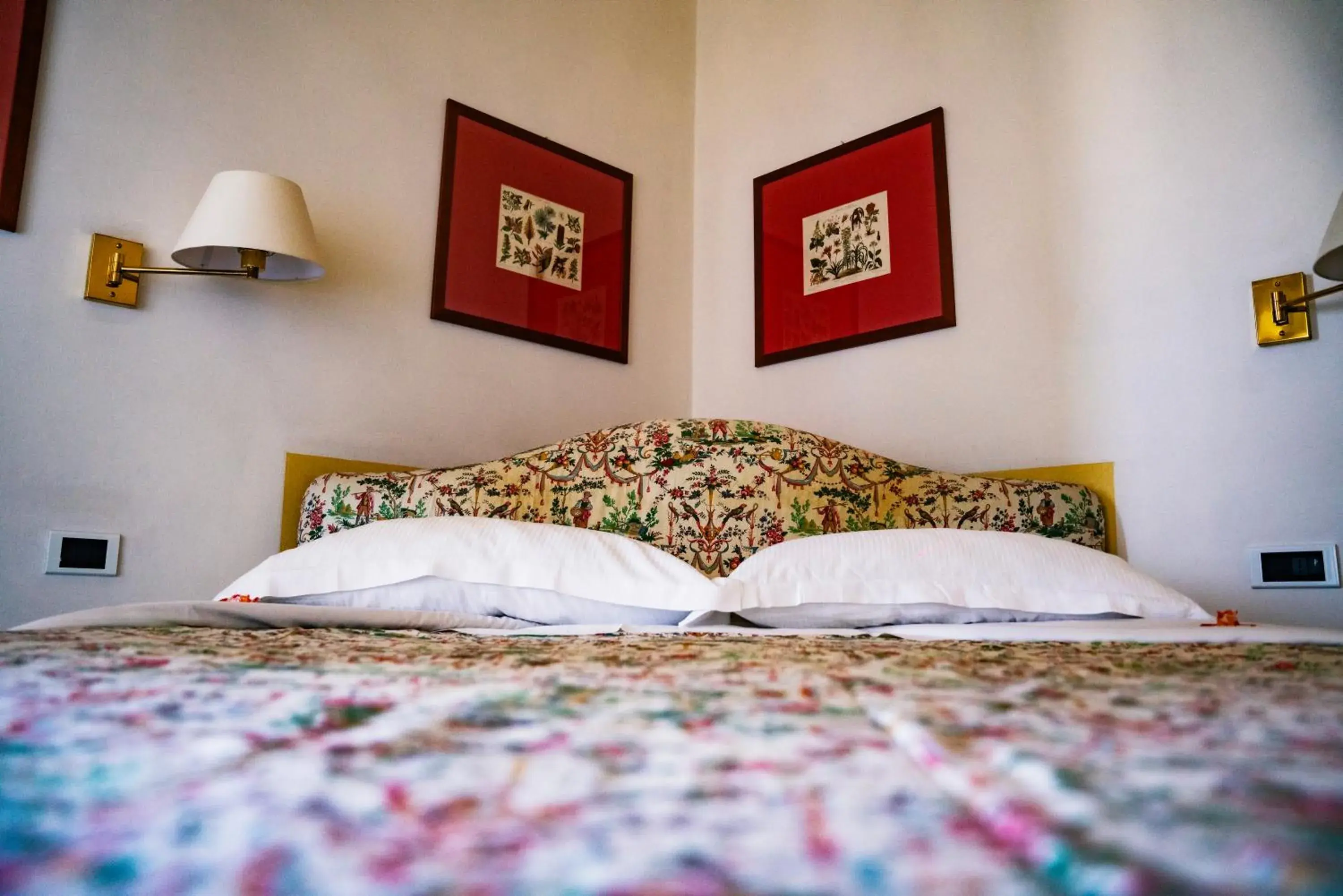 Bed in Relais Villa Pomela