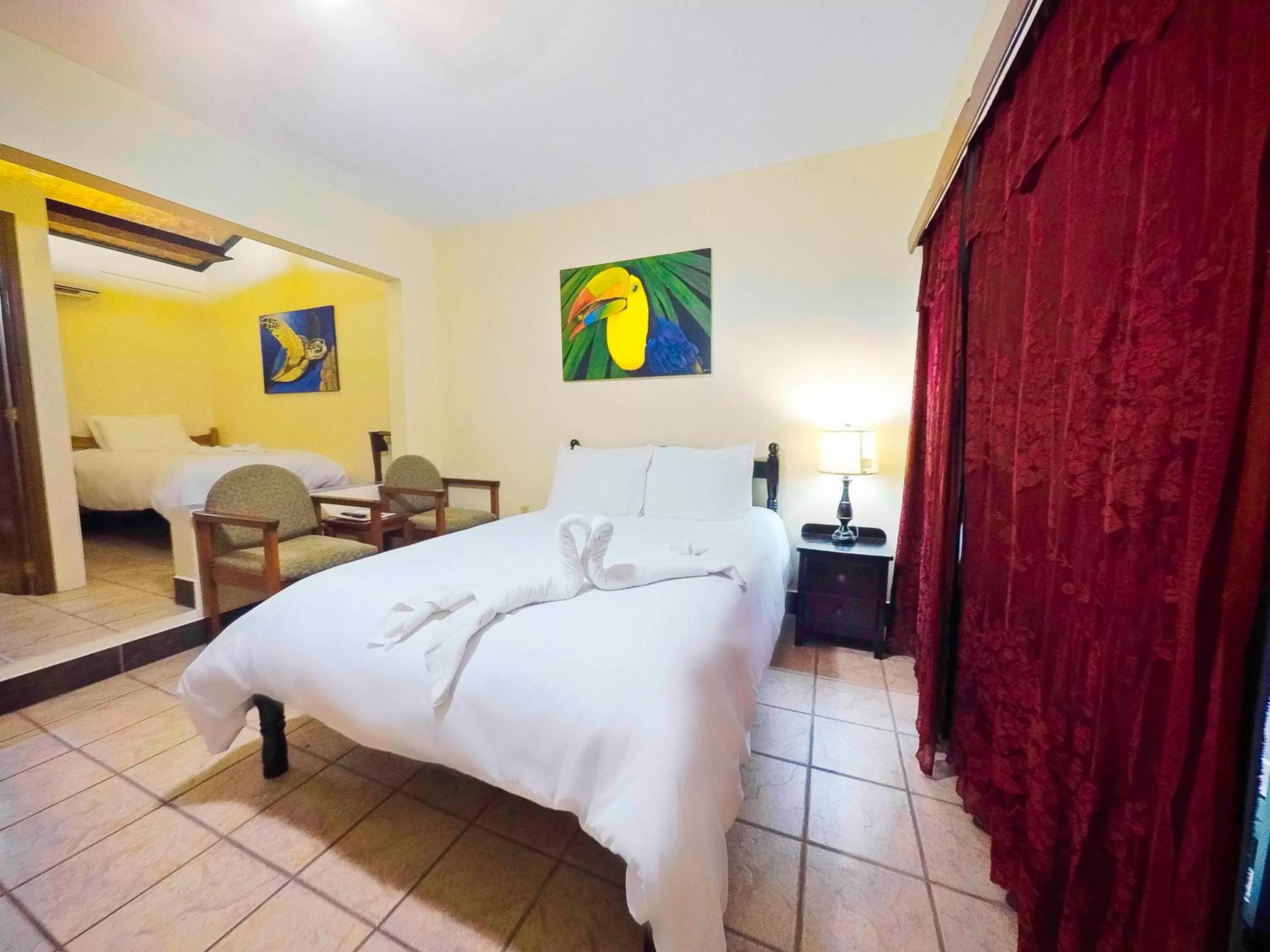 Bed in Rumors Resort Hotel