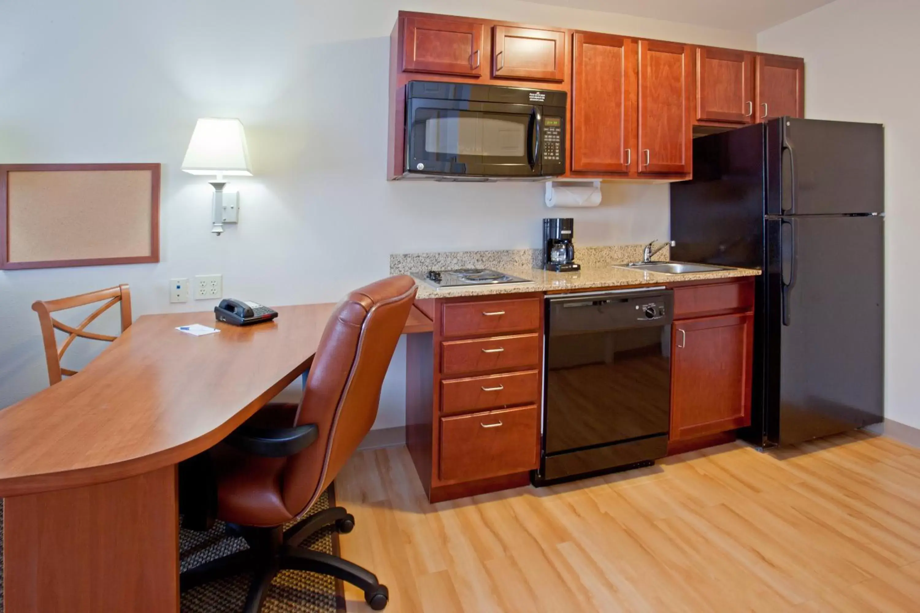 Photo of the whole room, Kitchen/Kitchenette in Candlewood Suites Houston Westchase - Westheimer, an IHG Hotel