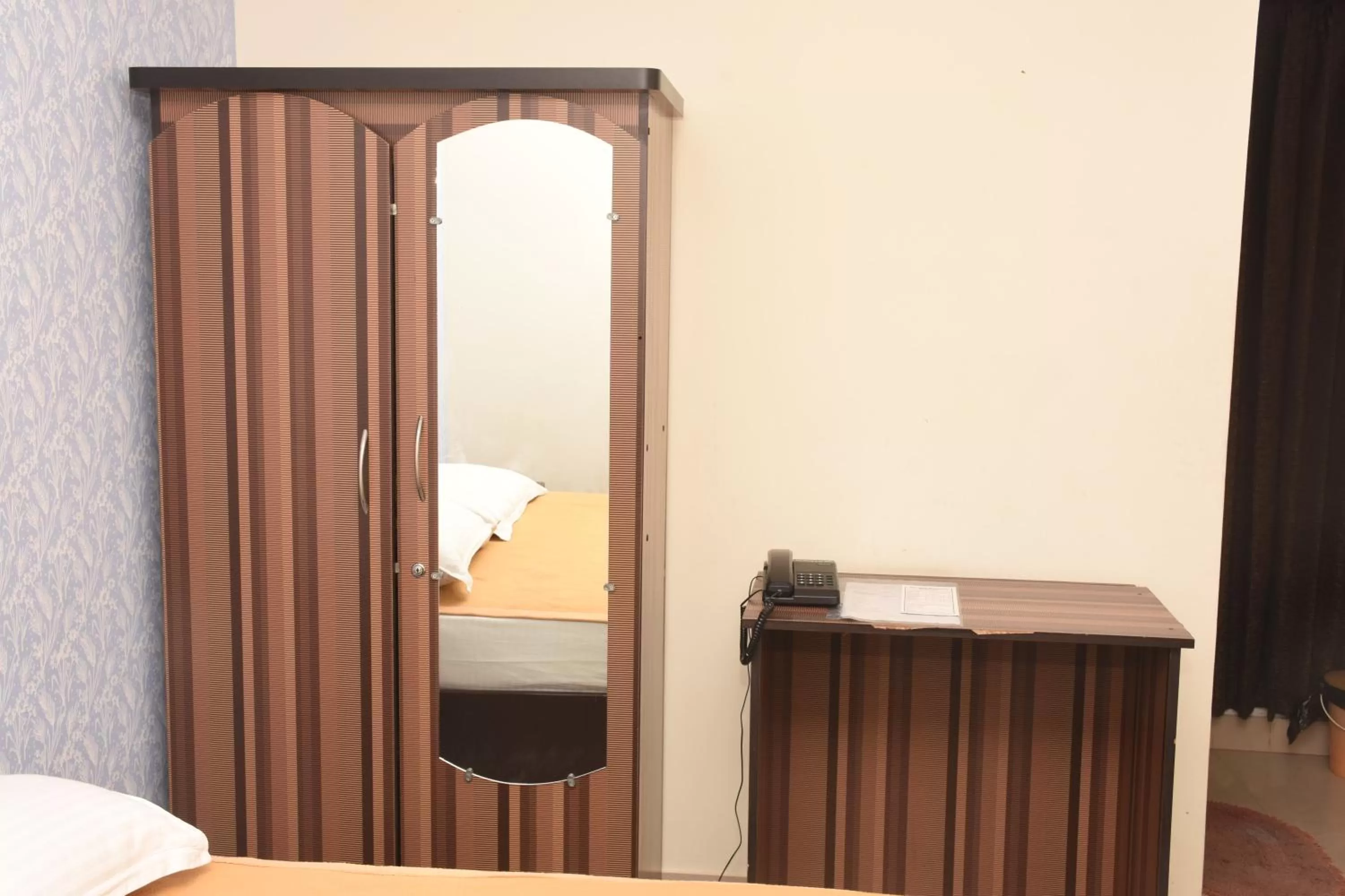 Bed in Star MSR Residency