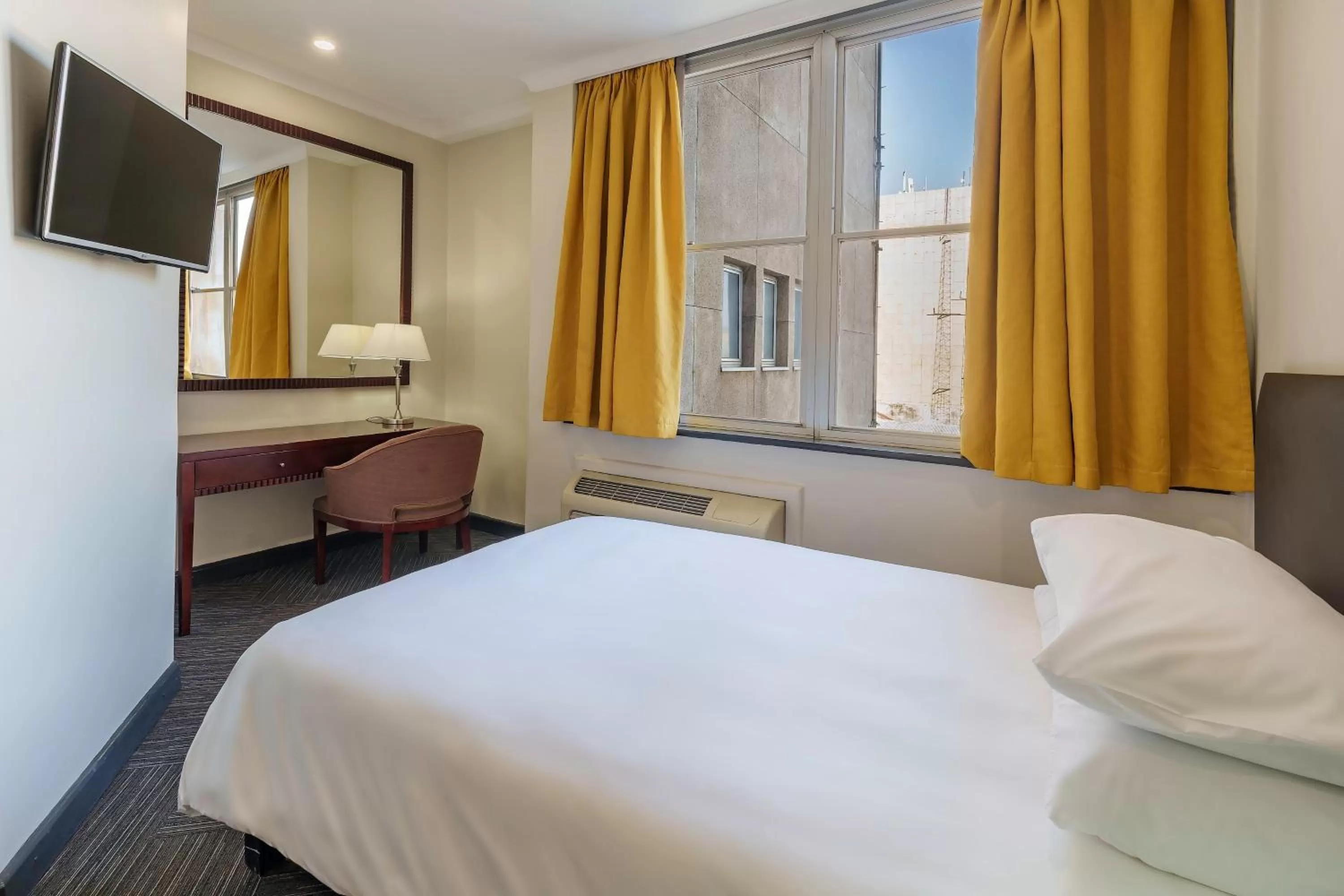 Photo of the whole room, Bed in Protea Hotel by Marriott Lusaka Cairo Road