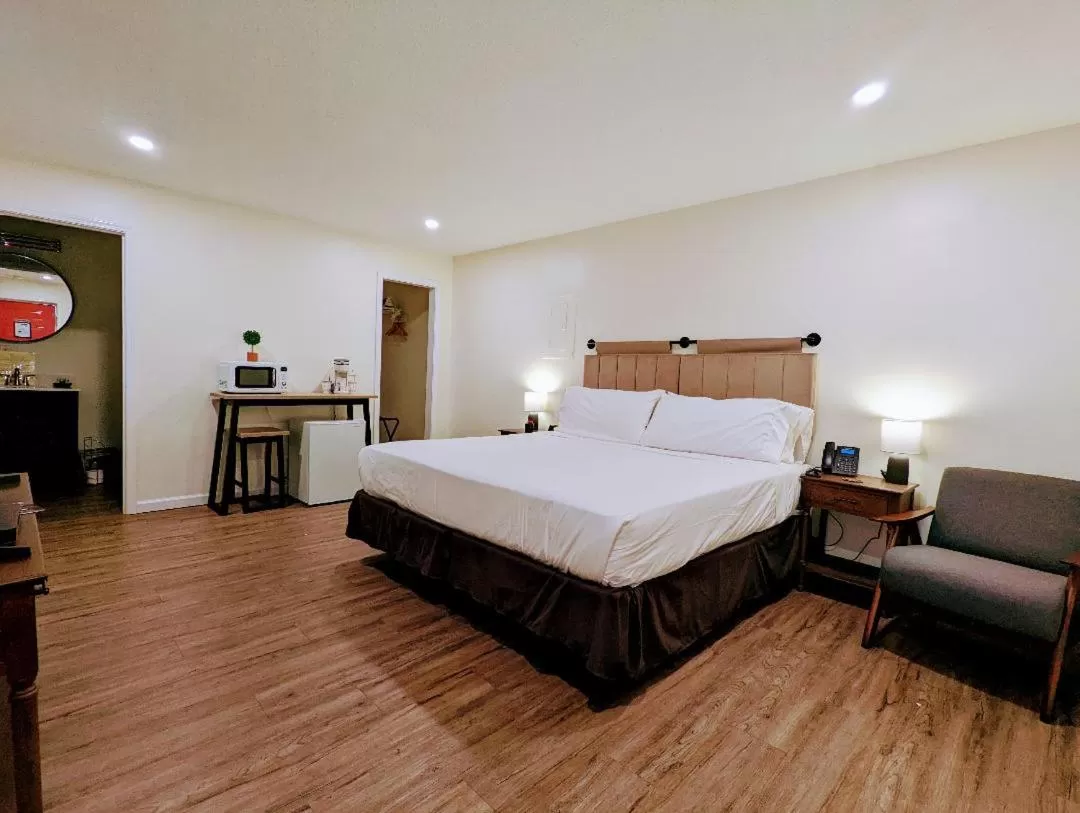 Bed in The Honey Bee Motel