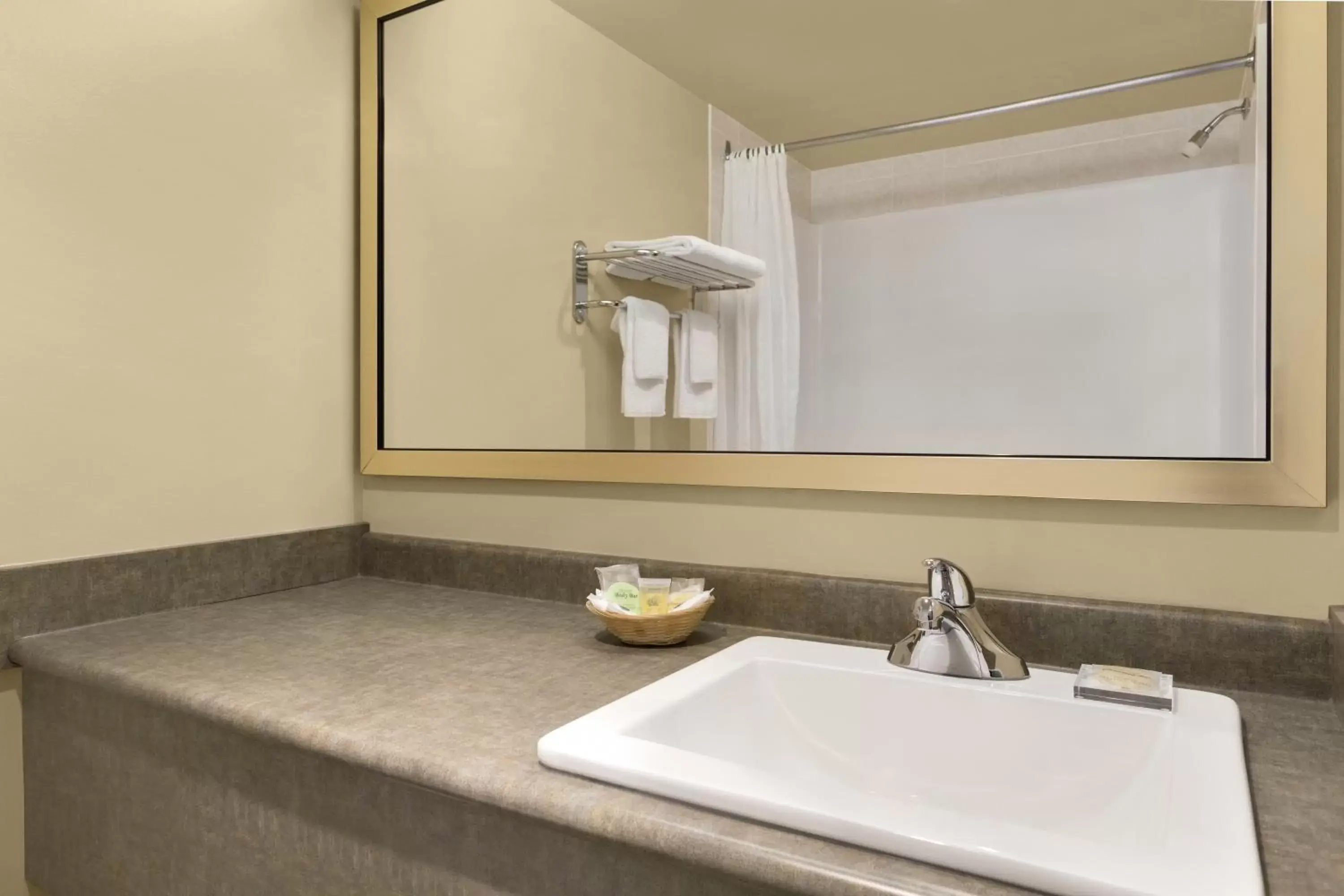 Bathroom in Colonial Square Inn & Suites