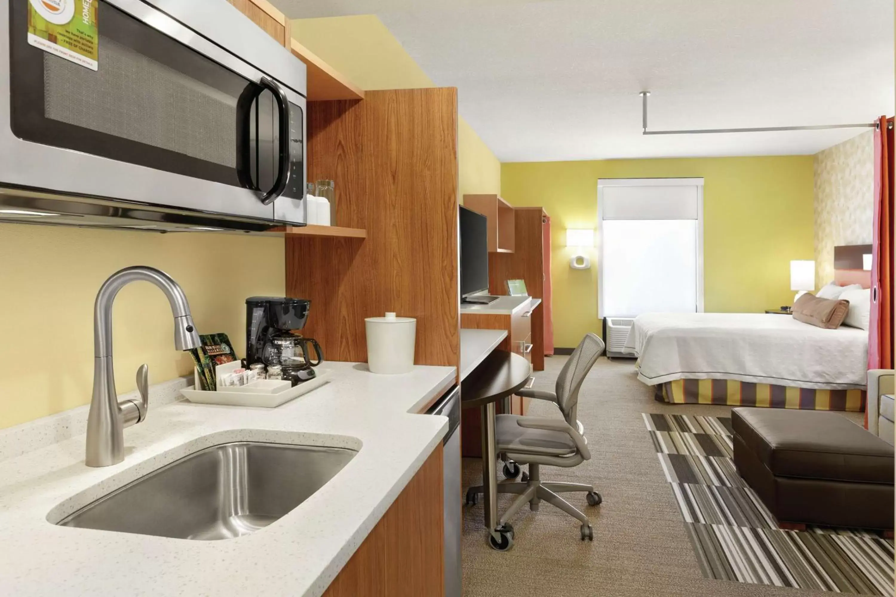 Bedroom, Kitchen/Kitchenette in Home2 Suites By Hilton Gainesville