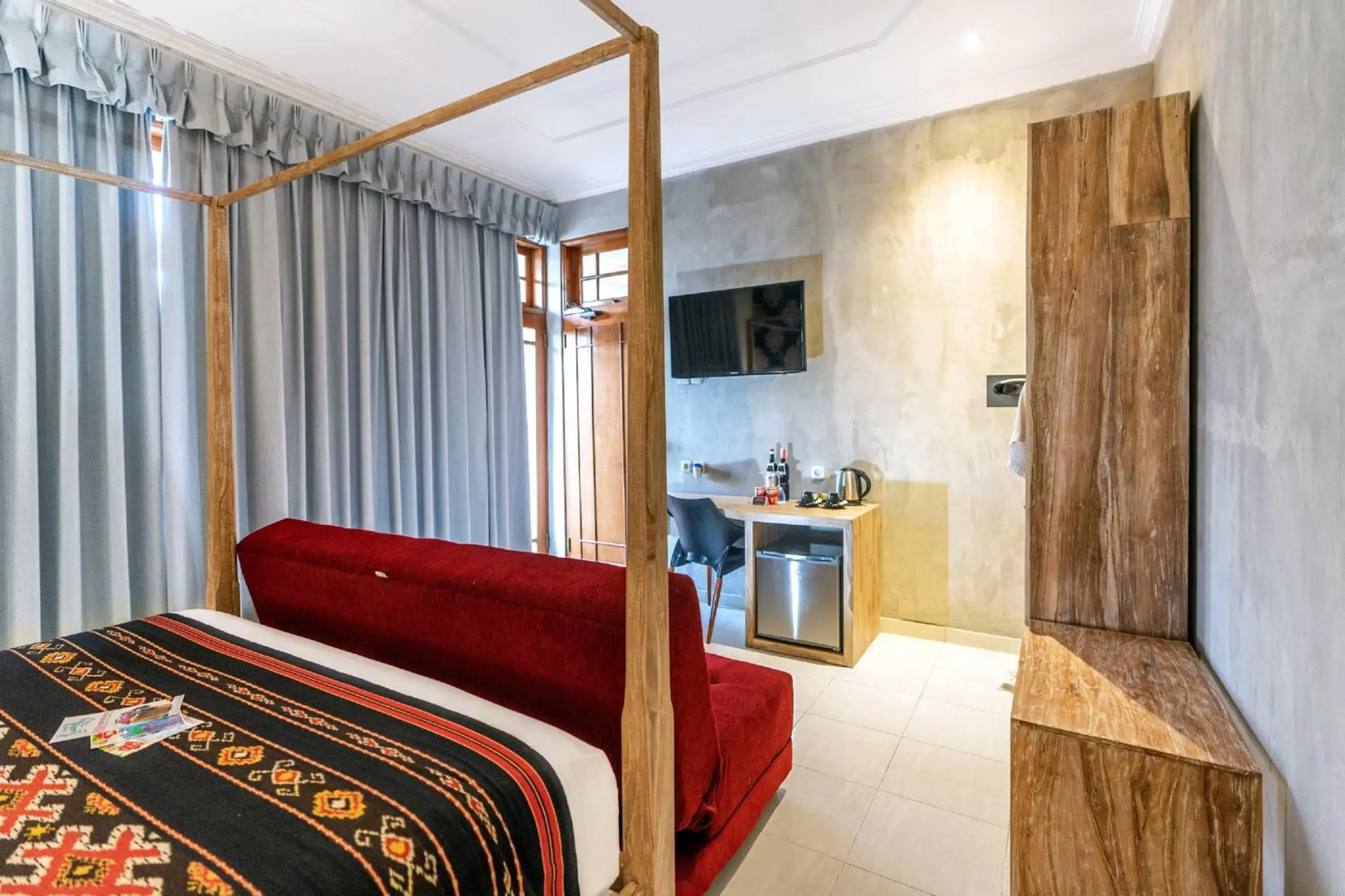 Bed in 18 Suite Villa Loft at Kuta