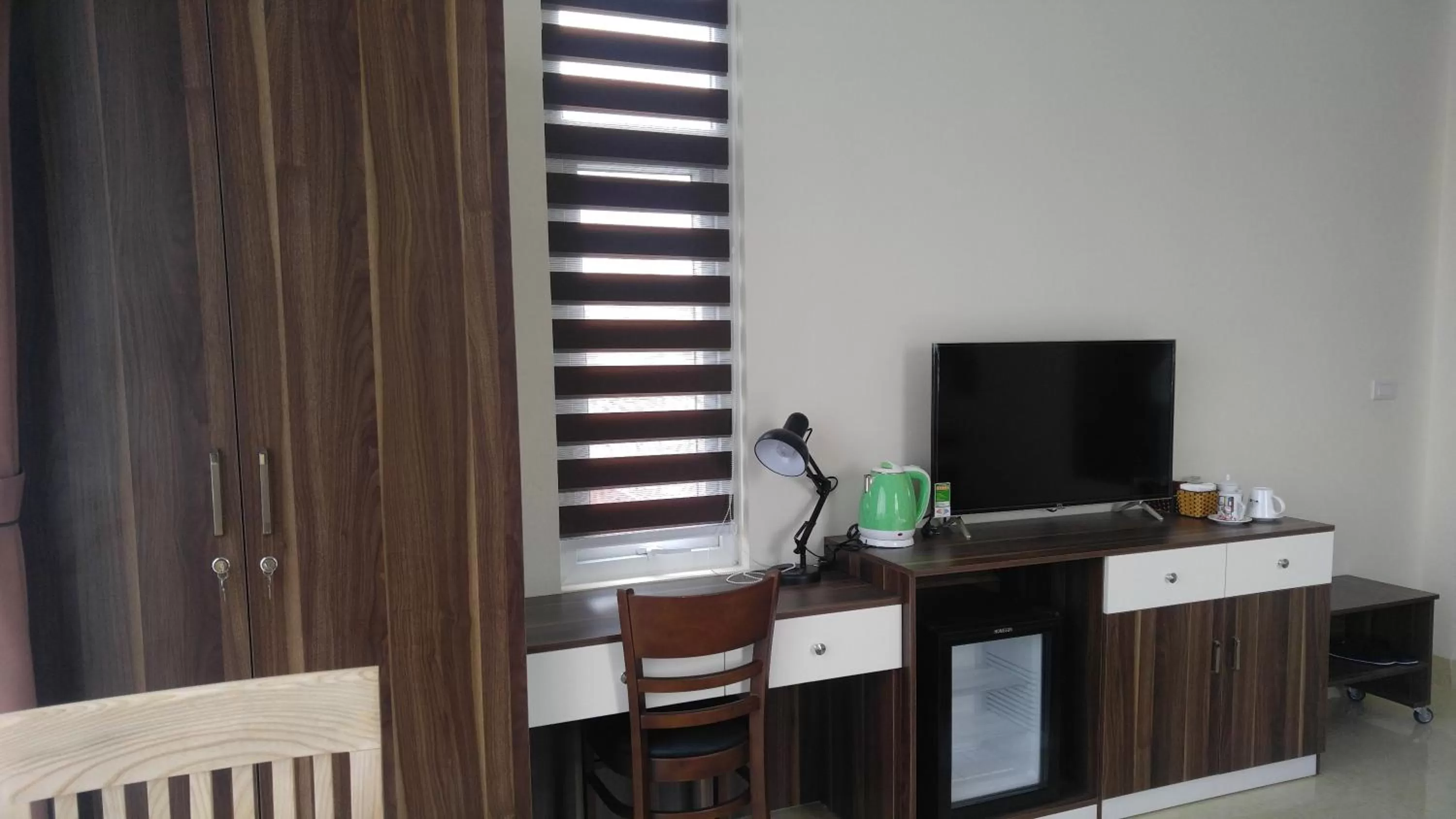 Bedroom in Friendly Home Hotel