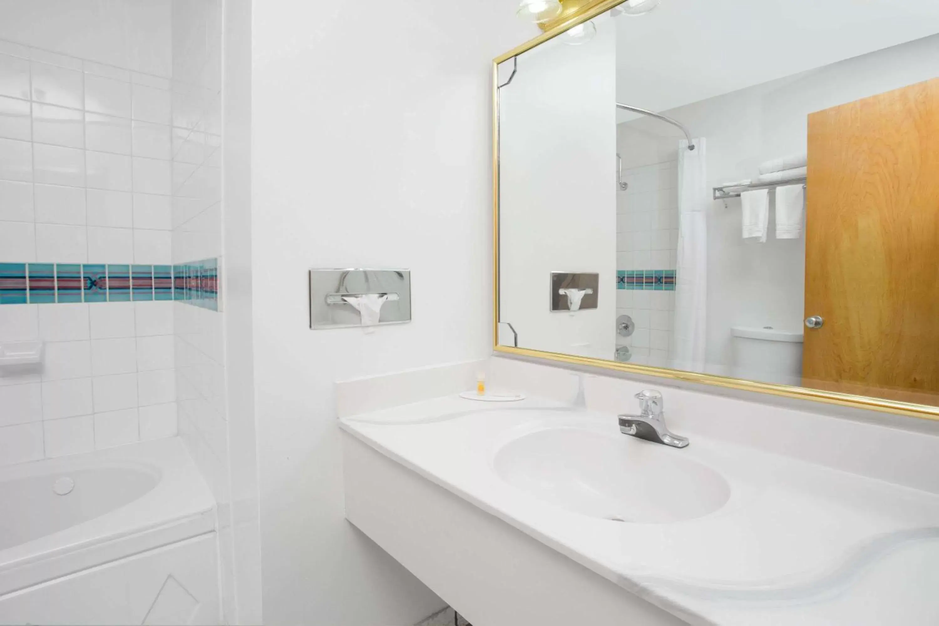 Bathroom in Days Inn & Suites by Wyndham Red Rock-Gallup