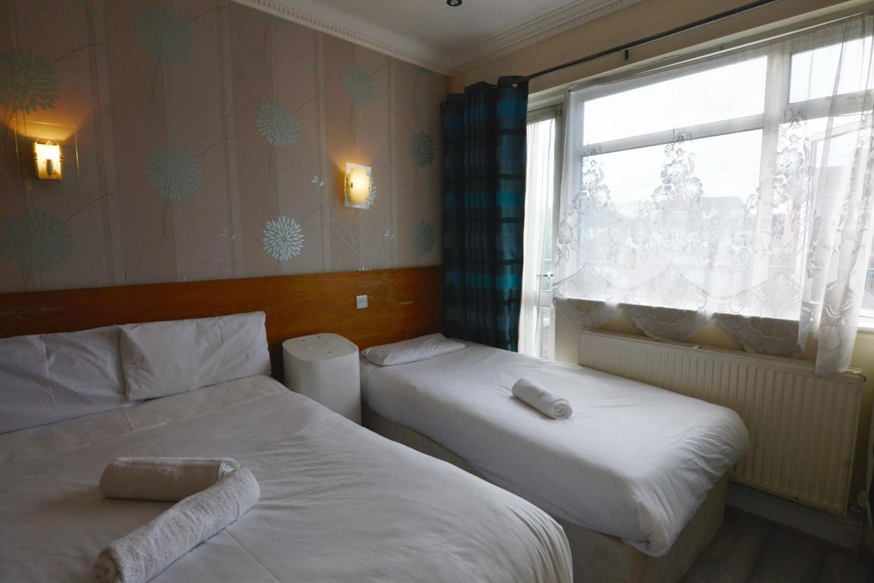 Bed in Anchor Guest House