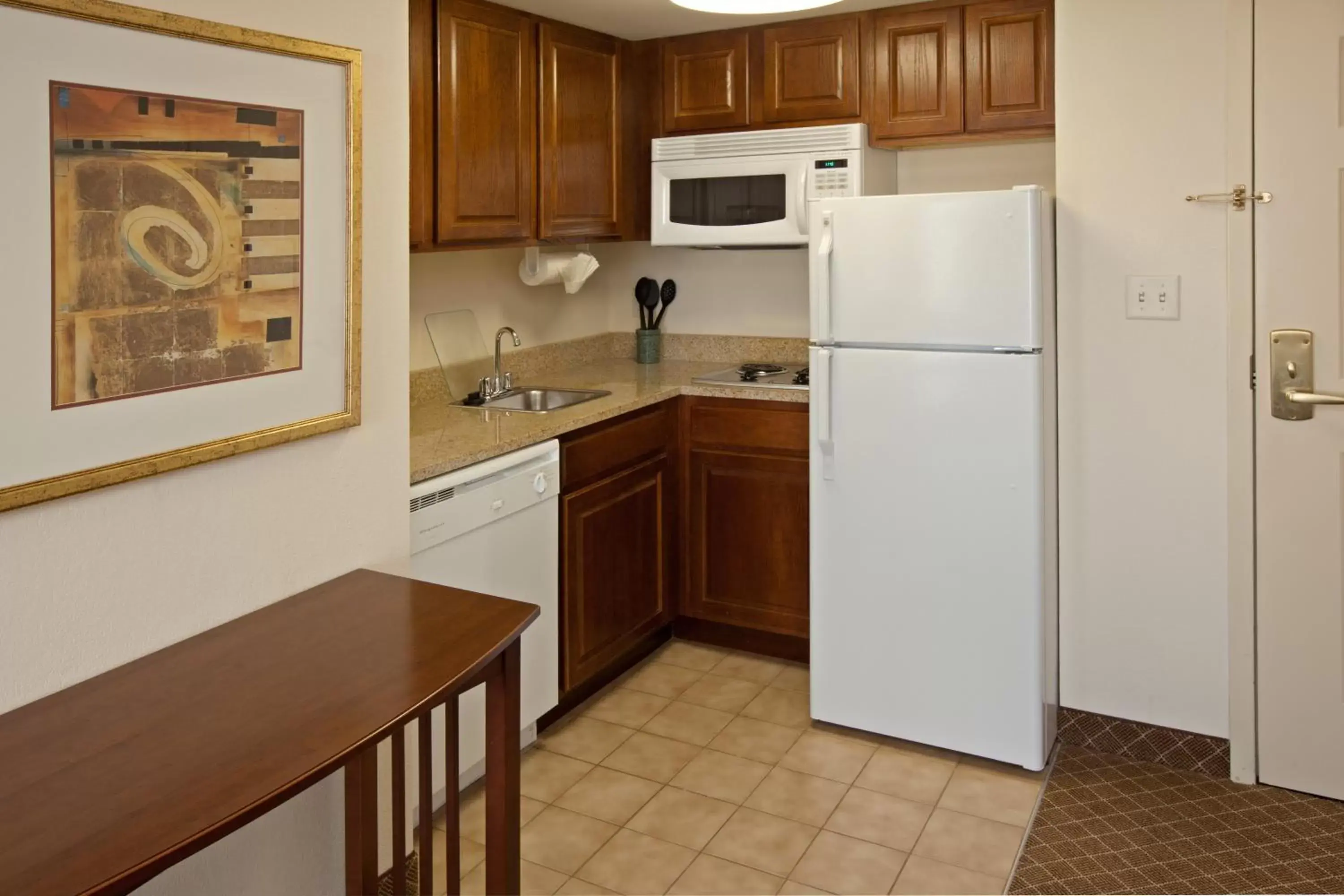 Photo of the whole room, Kitchen/Kitchenette in Staybridge Suites Indianapolis-Airport, an IHG Hotel