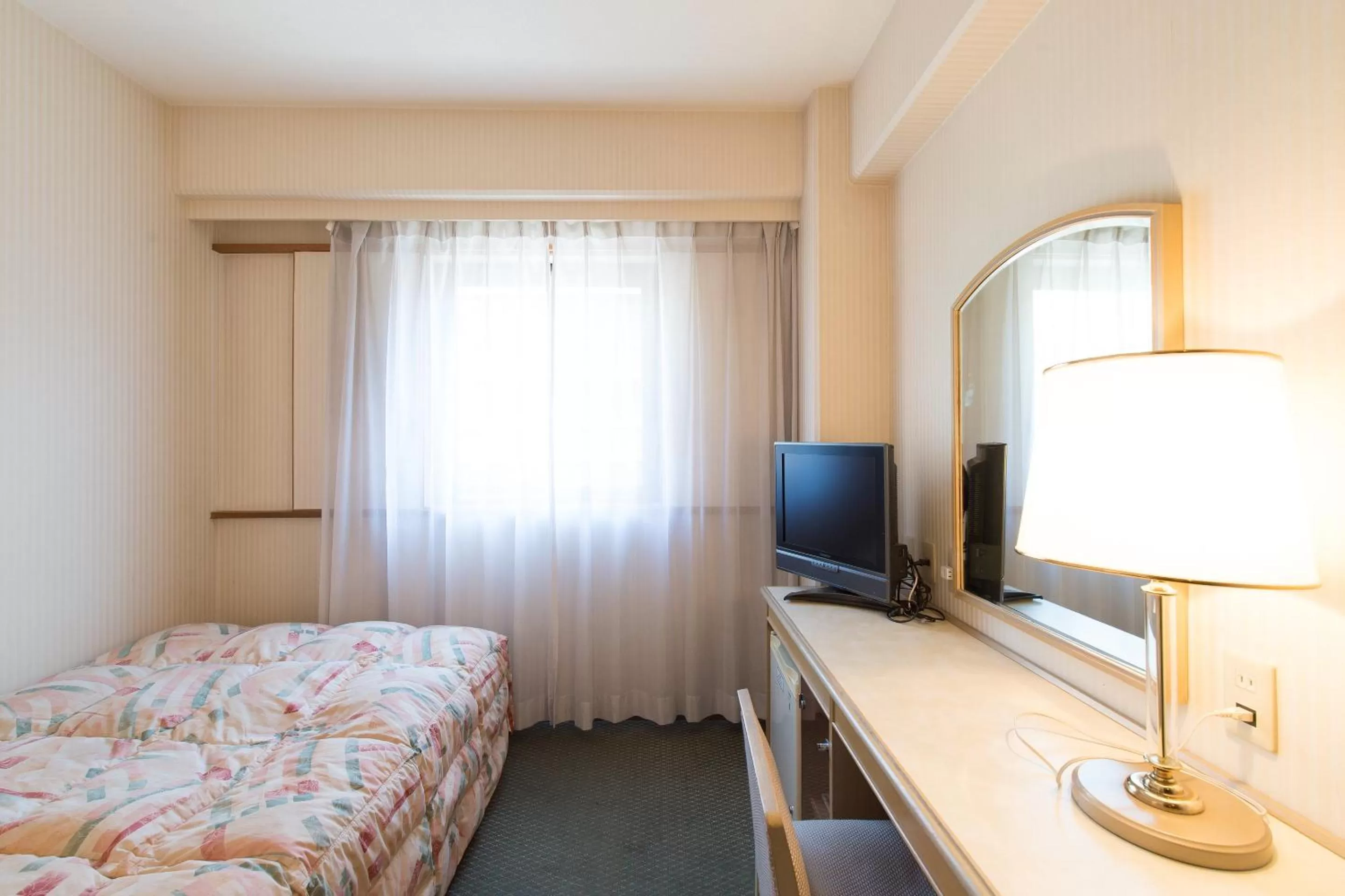 Photo of the whole room, Bed in Tabist Hotel Tetora Kitakyushu